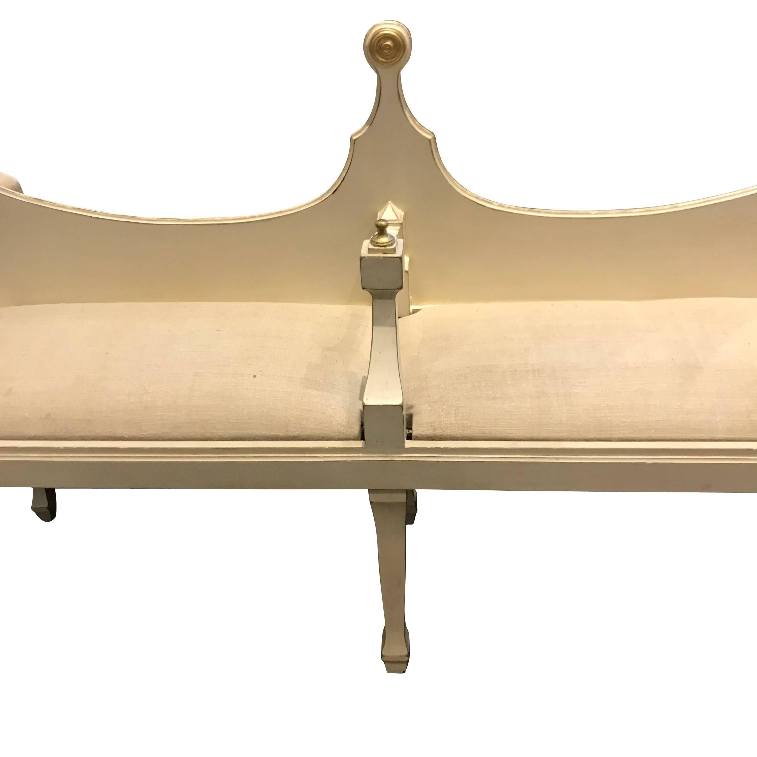 1940s, Italian very decorative Italian two-seat rubbed white wooden bench with gold gilt wooden decorations.
Newly reupholstered in vintage Belgian linen.