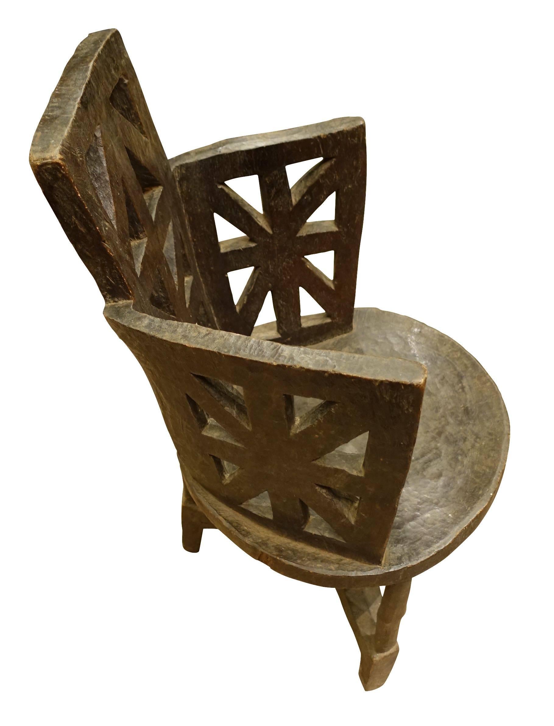 1920s Ethiopian primitive hand-carved dark brown wood Walaita side chair.
Sculptural, looks good from all sides.
ARRIVING END MARCH
 