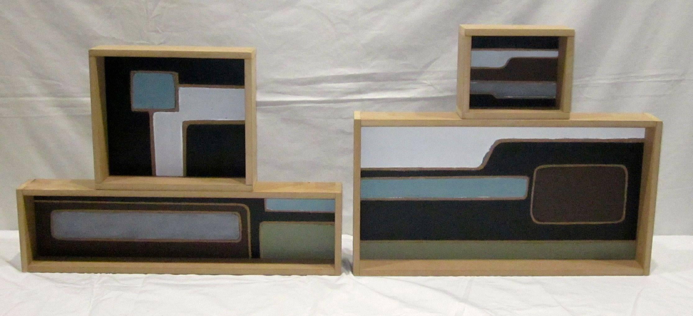 French artist Pierre Malbec has created a collection of small abstract acrylic paintings.
The paintings are in light wooden frames which make the paintings appear to be in boxes.
The variety of sizes range from 6