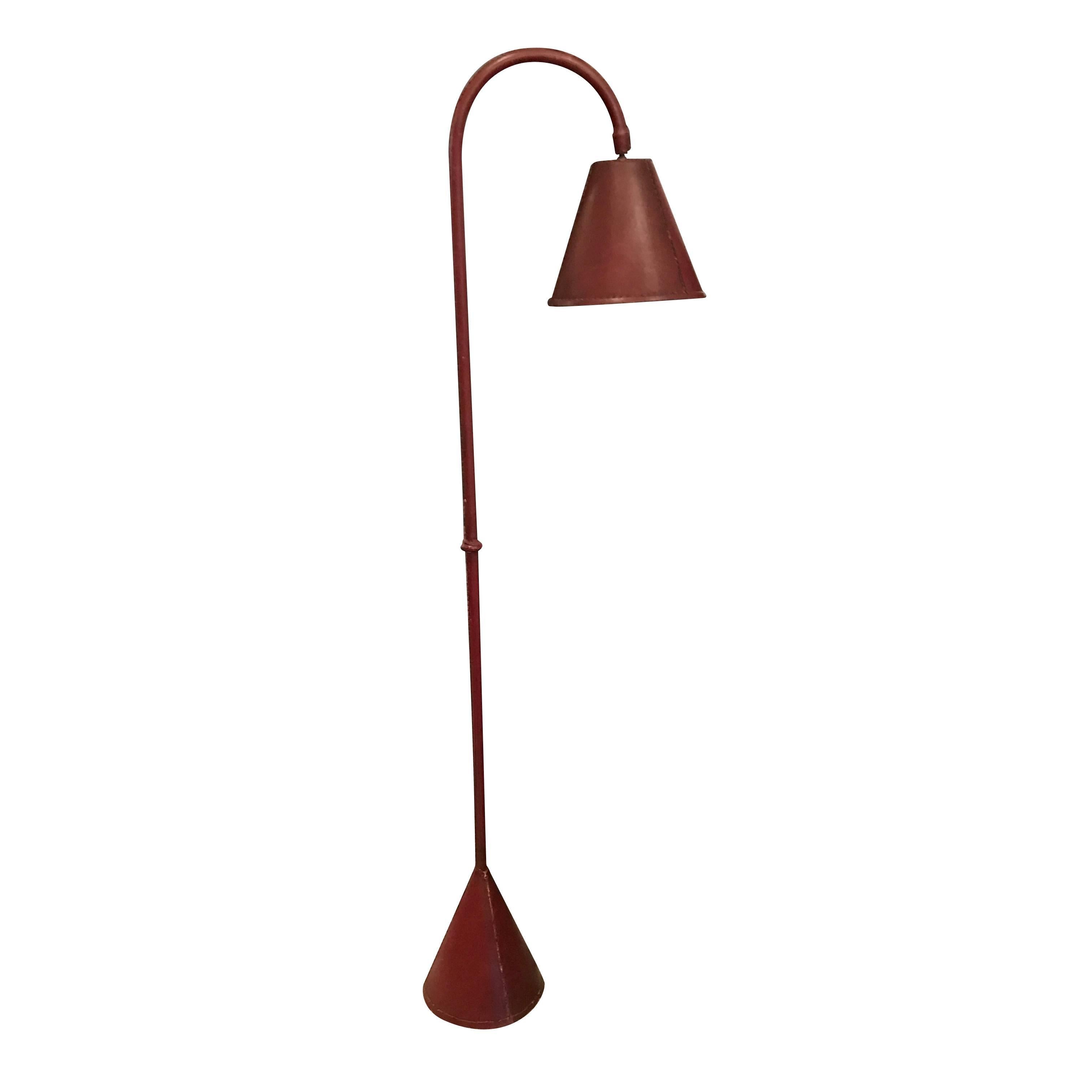 Mid-Century, Spanish classic Valenti style red leather floor lamp.
Shade, base and upright all in red leather.
Recently restored and rewired.
Shade is 14