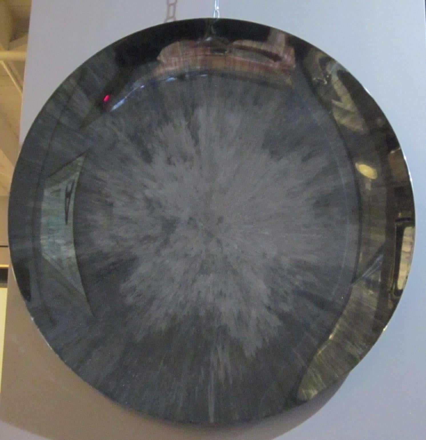 Contemporary French handmade large smoked glass concave mirror.
Shades of dark grey.
 