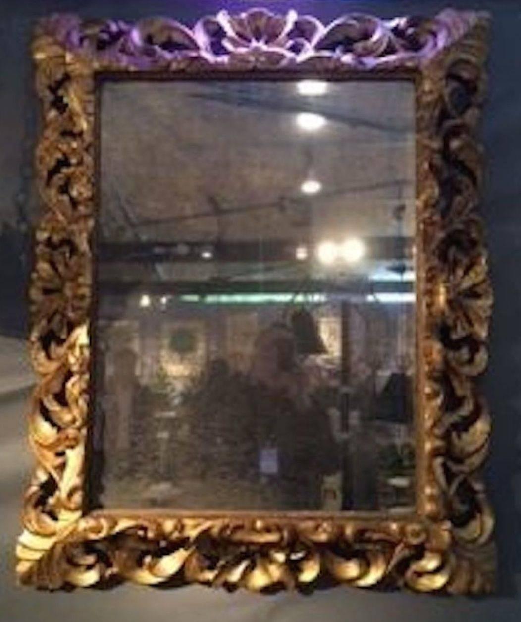 French Ornately Carved Gold Giltwood Mirror, France, circa 1830