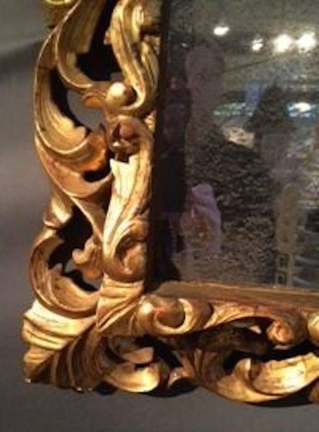 Ornately Carved Gold Giltwood Mirror, France, circa 1830 In Excellent Condition In New York, NY