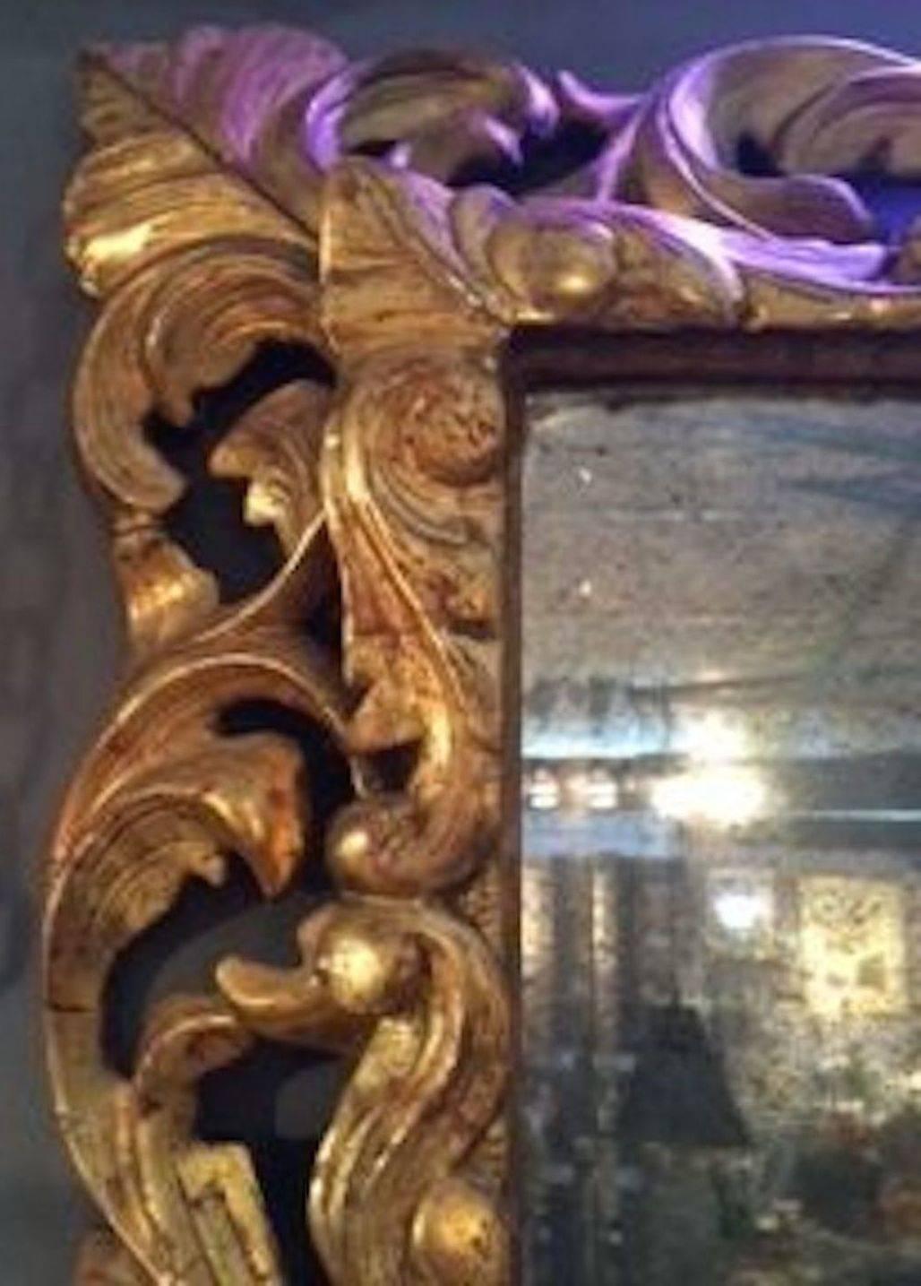 Ornately Carved Gold Giltwood Mirror, France, circa 1830 2