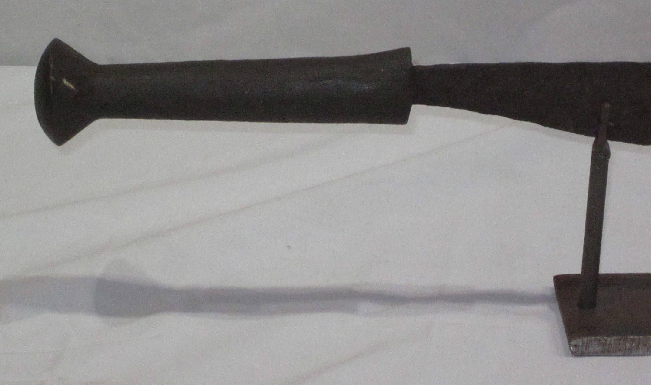 1920s African Congolese sword sculpture.
Wooden handle. Base measures 12