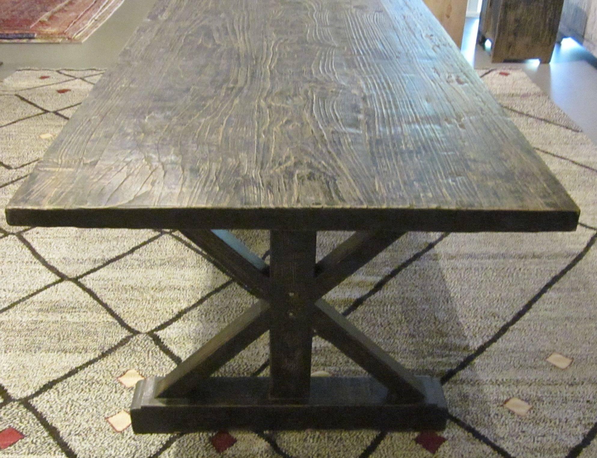 Indonesian 19th century cerused vintage pine wide plank top dining table.
Made with a contemporary cross leg base.
Top is 19th century, base is contemporary.
