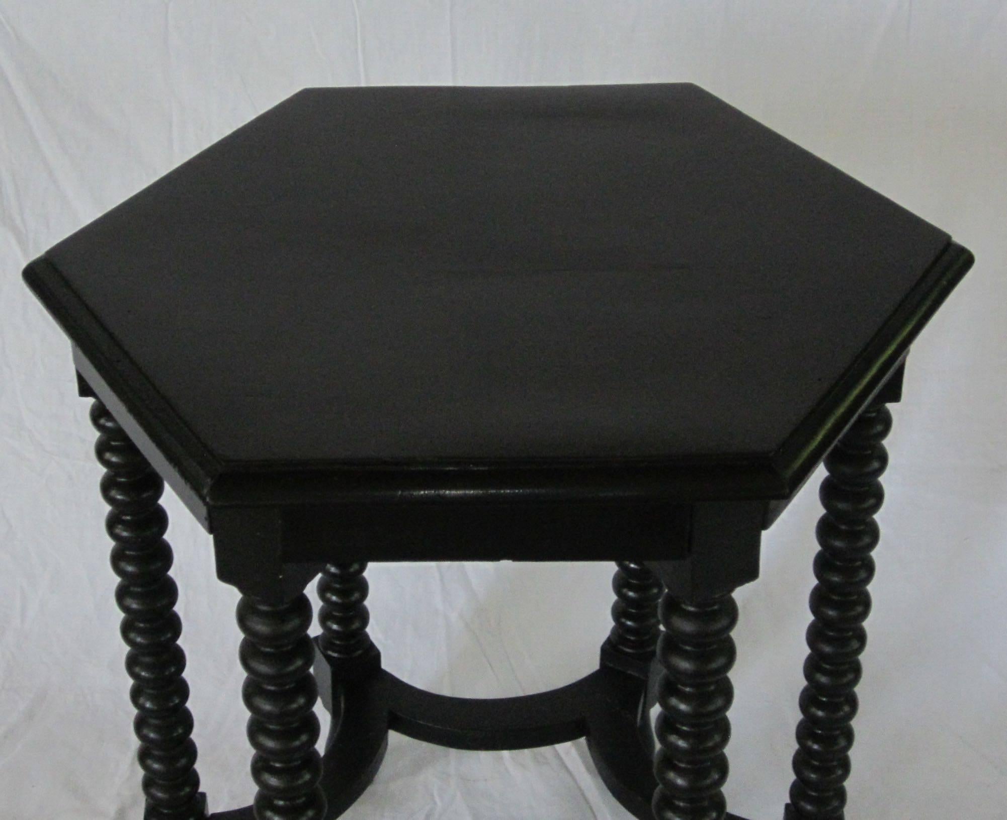 19th century Italian black ebony hexagonal spool leg side table.
