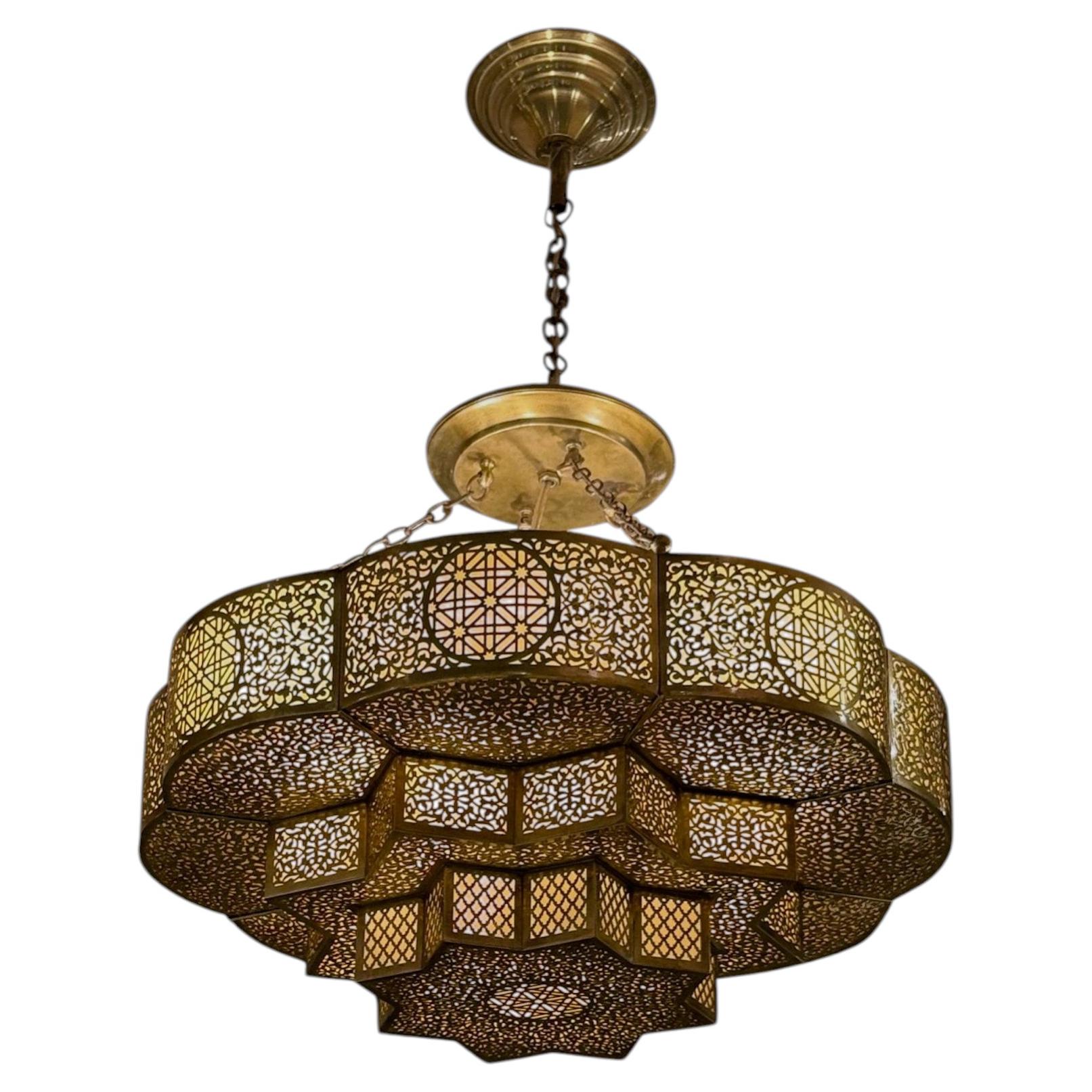 Contemporary Moroccan Three Tiered Star Shaped Pierced Brass Chandelier