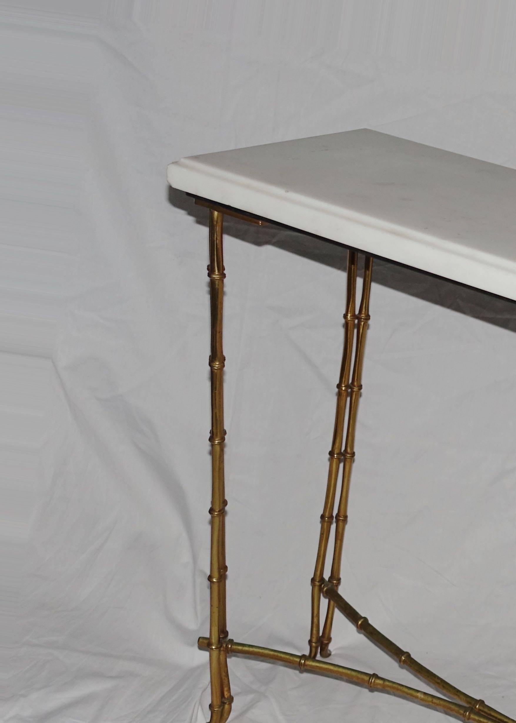 Mid-Century French Baguès bronze bamboo motif base with white marble-top coffee table.
Excellent condition.
