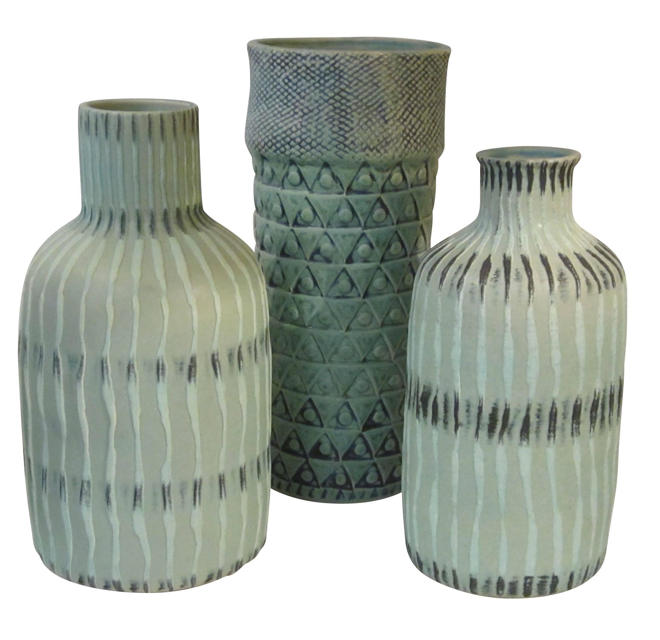 Contemporary medium sized seafoam textured and patterned stoneware vase from Thailand.
Part of an assortment of three textured vases which 
work beautifully as a collection or individually. See image #2.

        