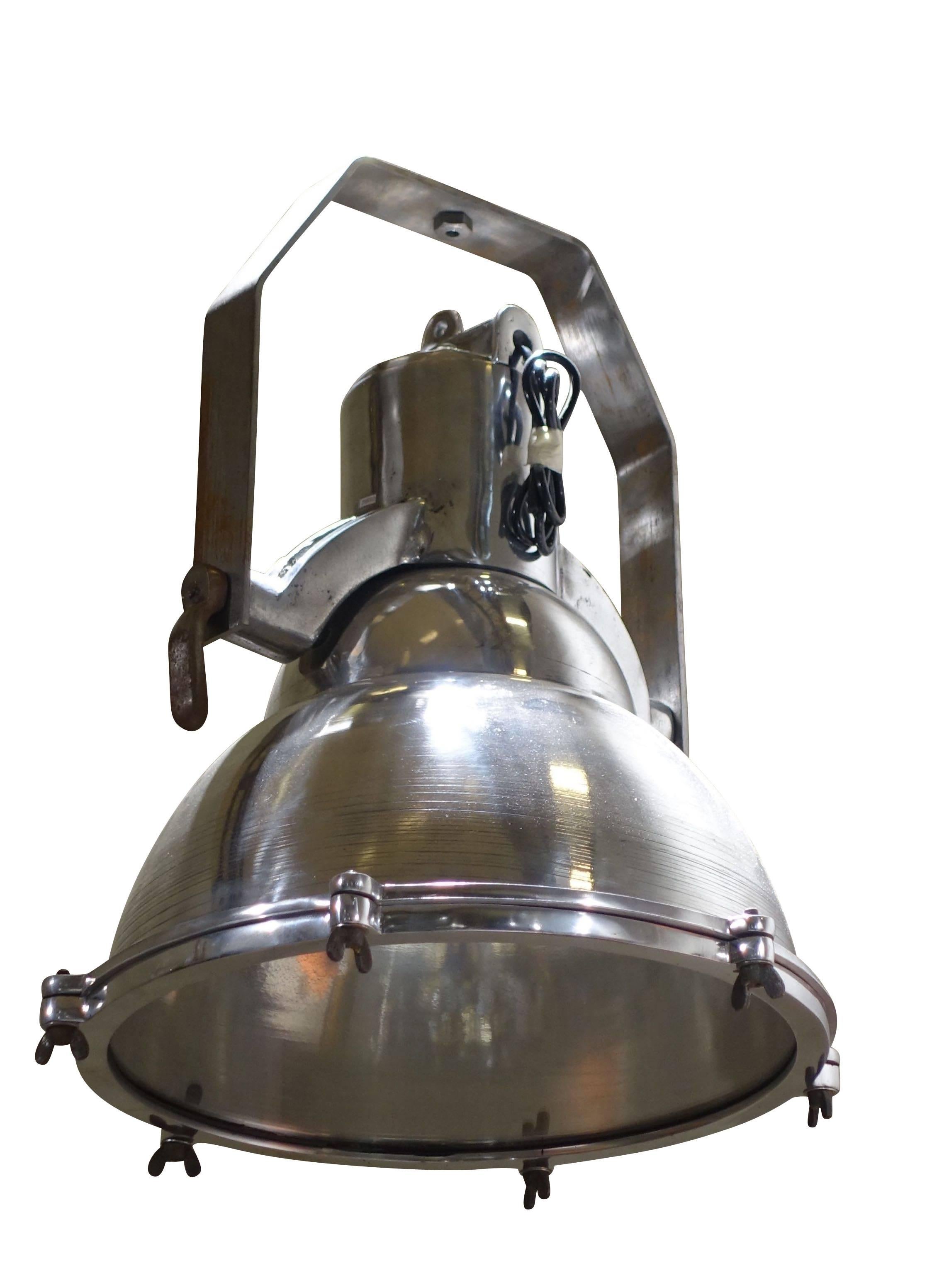 1930s English Industrial light originally used on a freighter as a search light.
Original hardware.
Made of aluminum and brushed steel.
Two available.
Excellent condition for age.