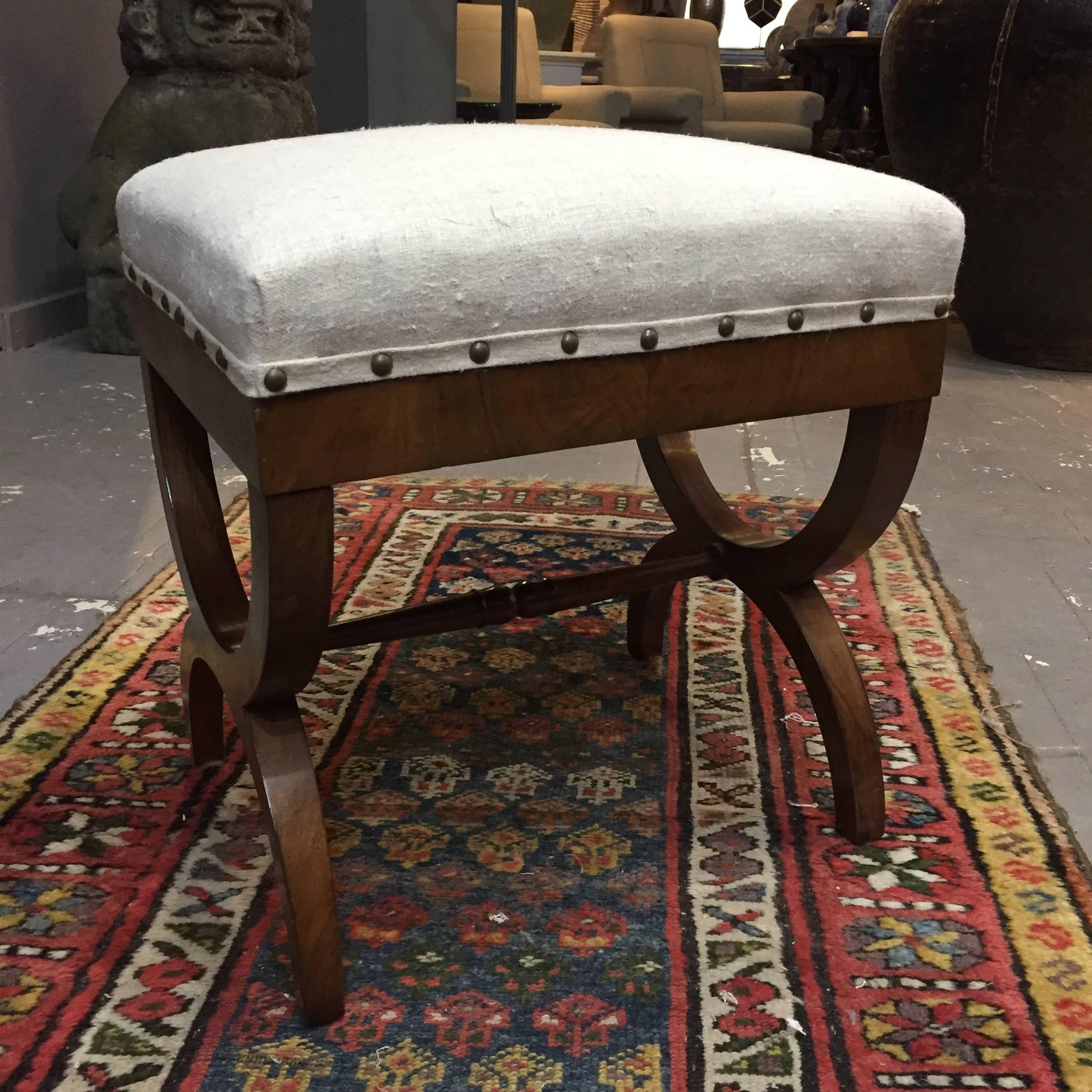 Italian Classic pair U shaped walnut framed foot stools, circa 1820.
Recently reupholstered in vintage homespun linen.