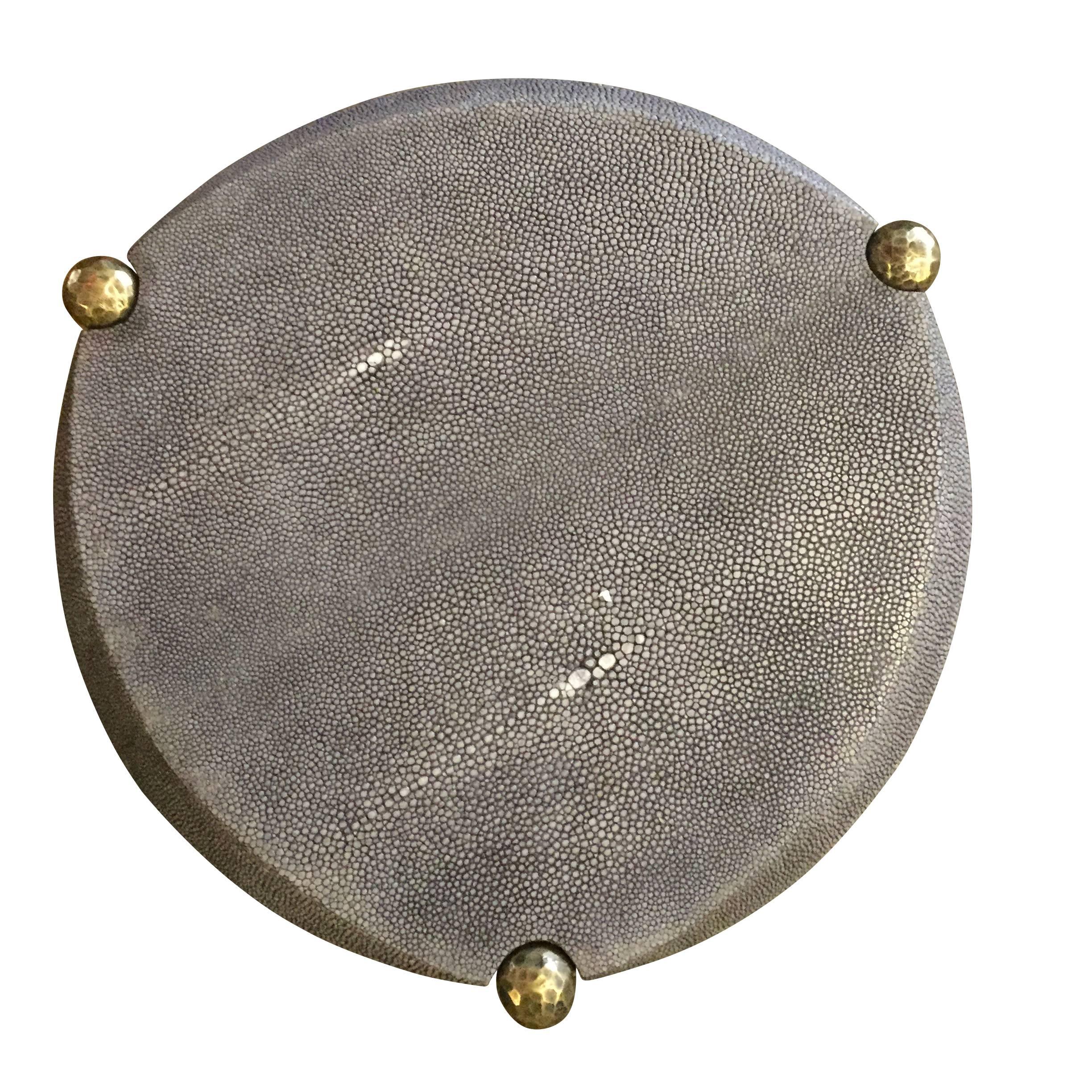 Contemporary French round grey shagreen top with hammered bronze base cocktail table.
Tapered legs and decorative criss cross base.
ARRIVING NOVEMBER 2018

 