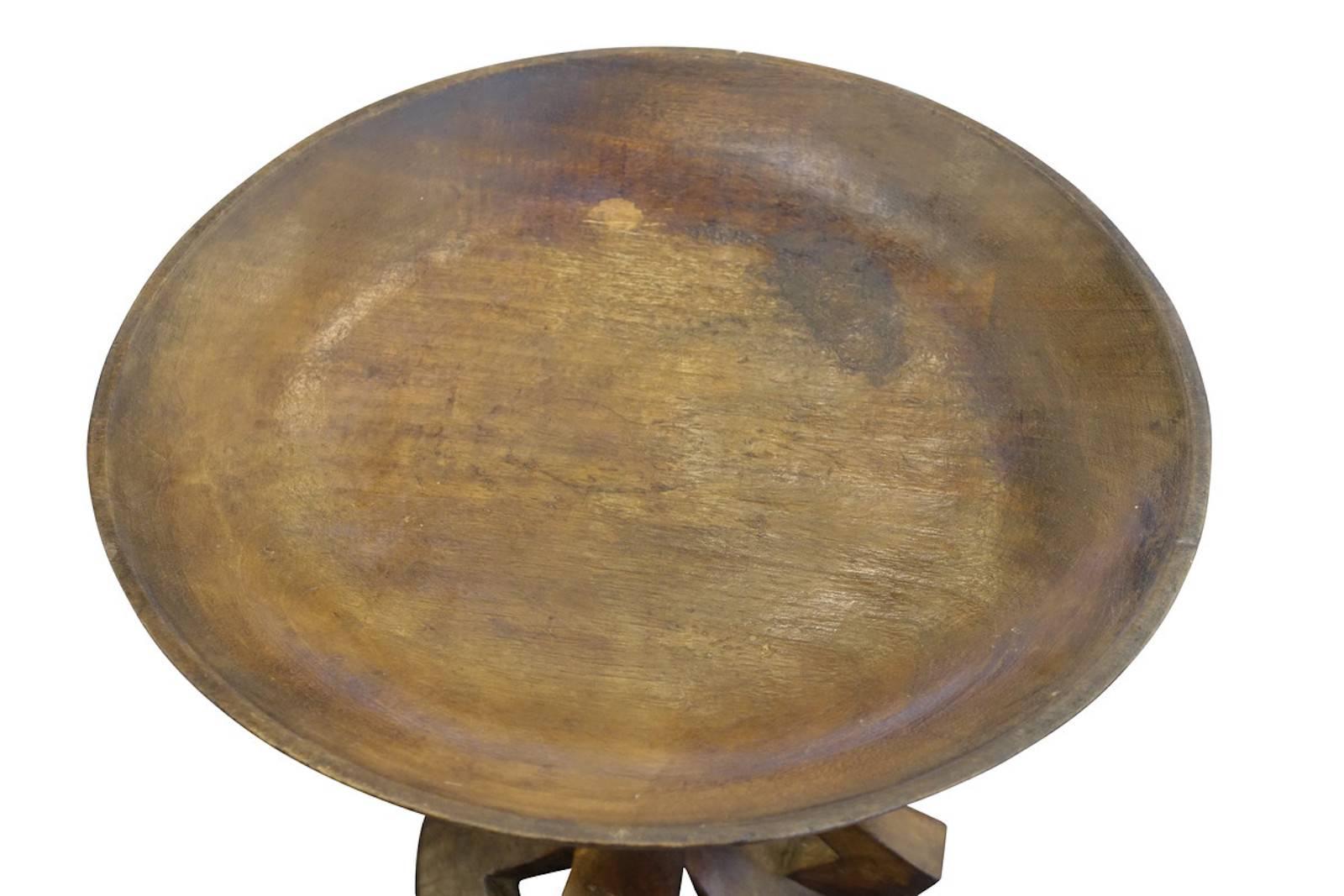 1930s from the Naga tribe in Northeast India, wooden side table with handle.
Decorative carvings.
 