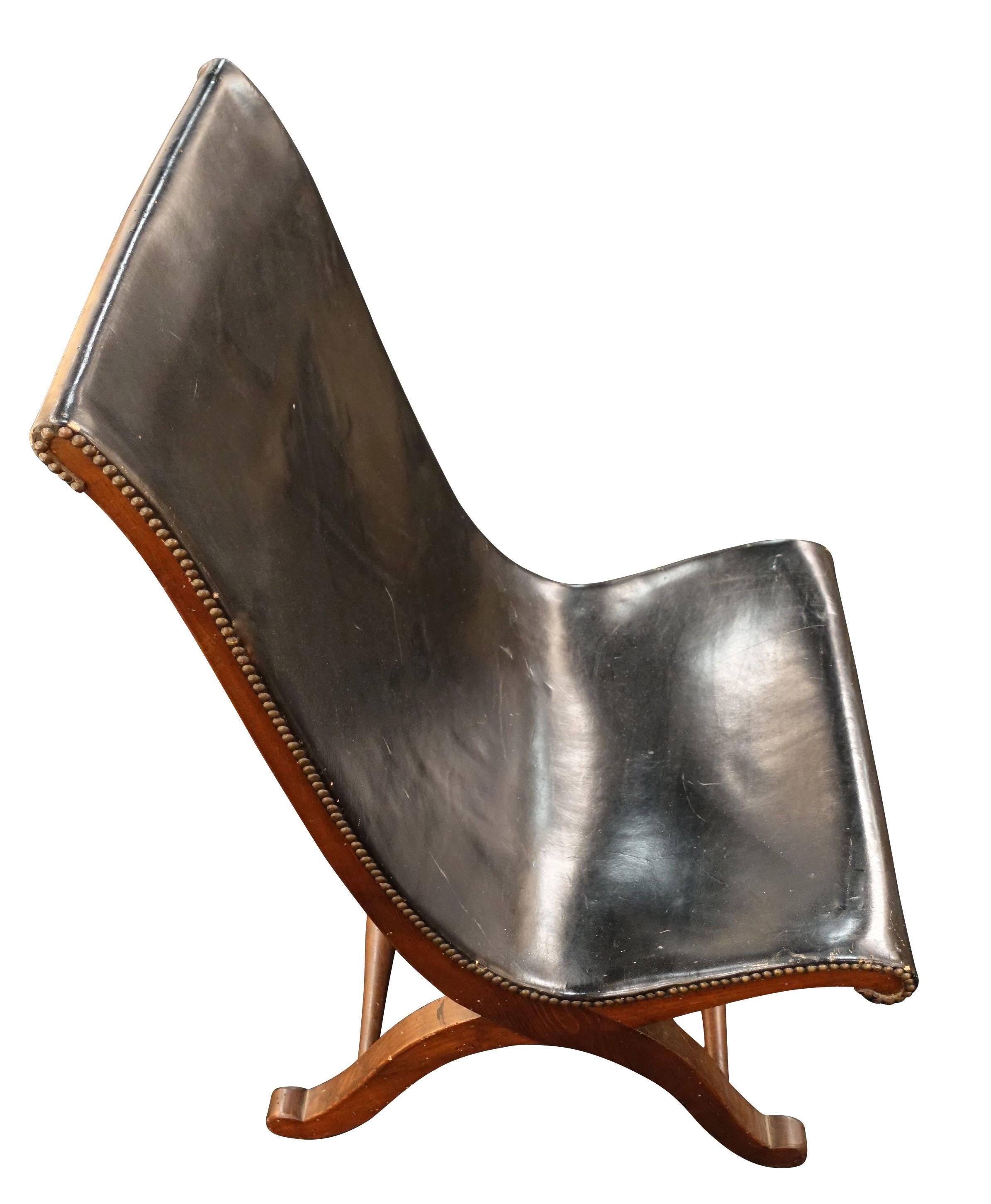 Mid-Century Spanish black leather Valenti side chair.
Signature wood base.
Very comfortable.
