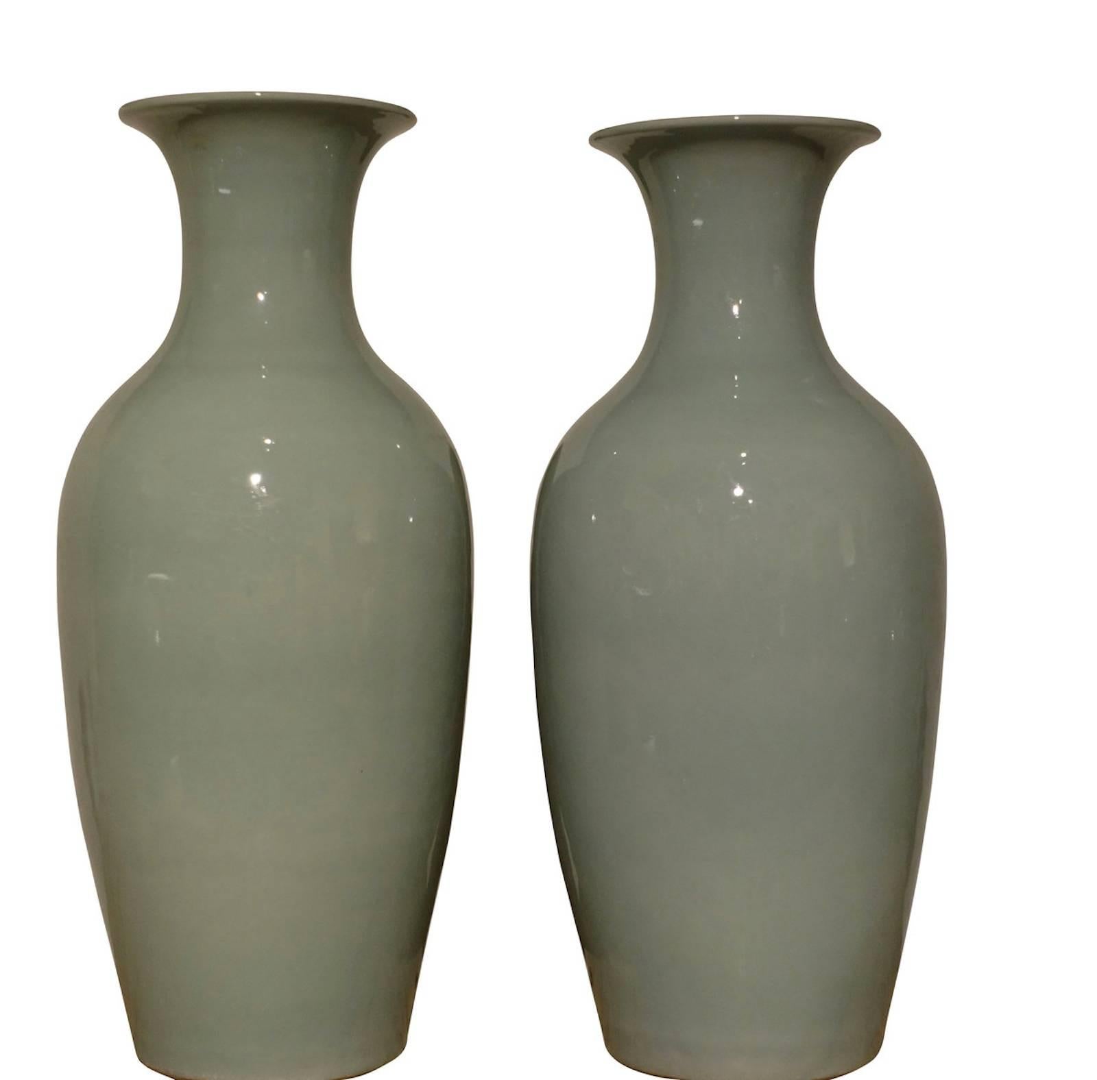 Contemporary Chinese collection of clear pale turquoise glazed vases in Classic shapes.
Size range 5 inches diameter to 6.5 inches diameter 
 5.5 inches tall to 11 inches tall
Sold individually.
 