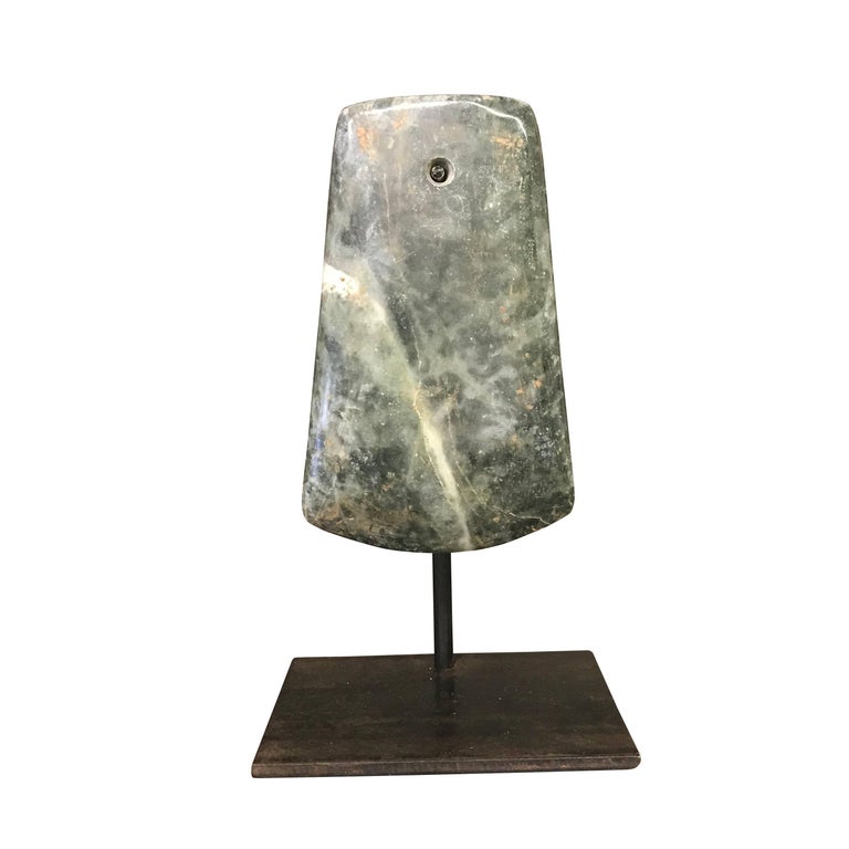 stone ax head sculpture