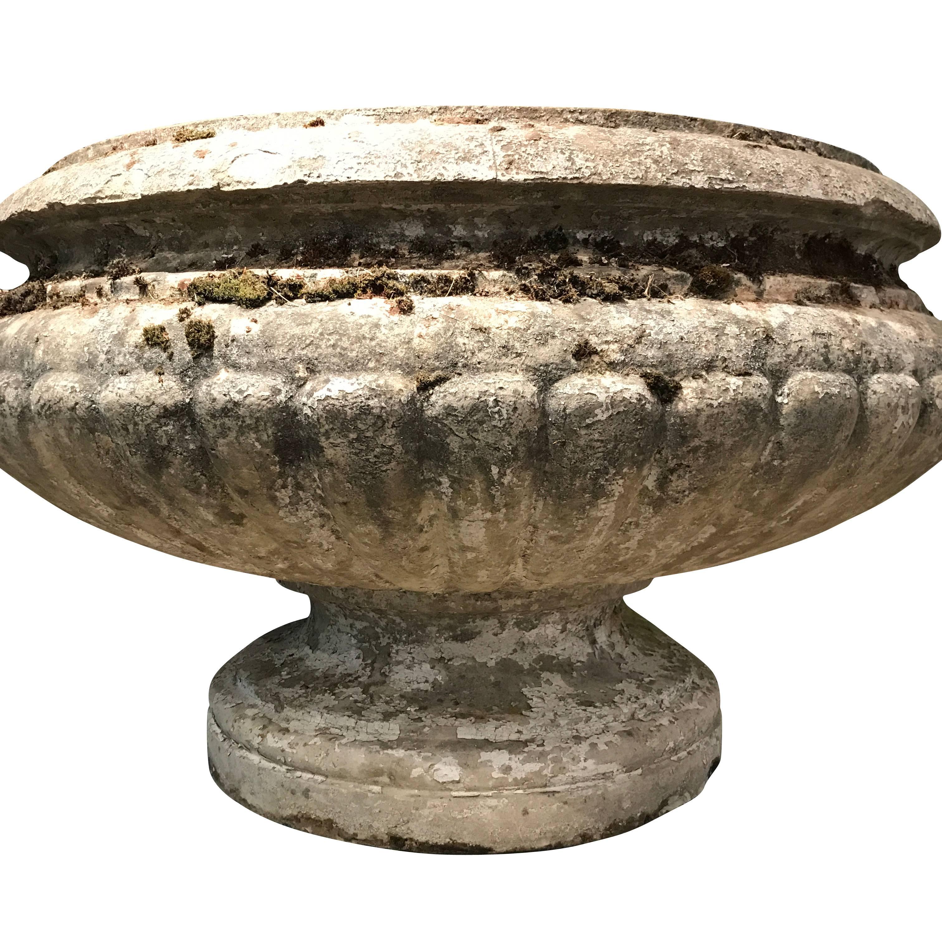 19th century, French very large one piece stone urn. 
Classic design.
Beautiful natural aged patina.
Impressive centerpiece in a garden.