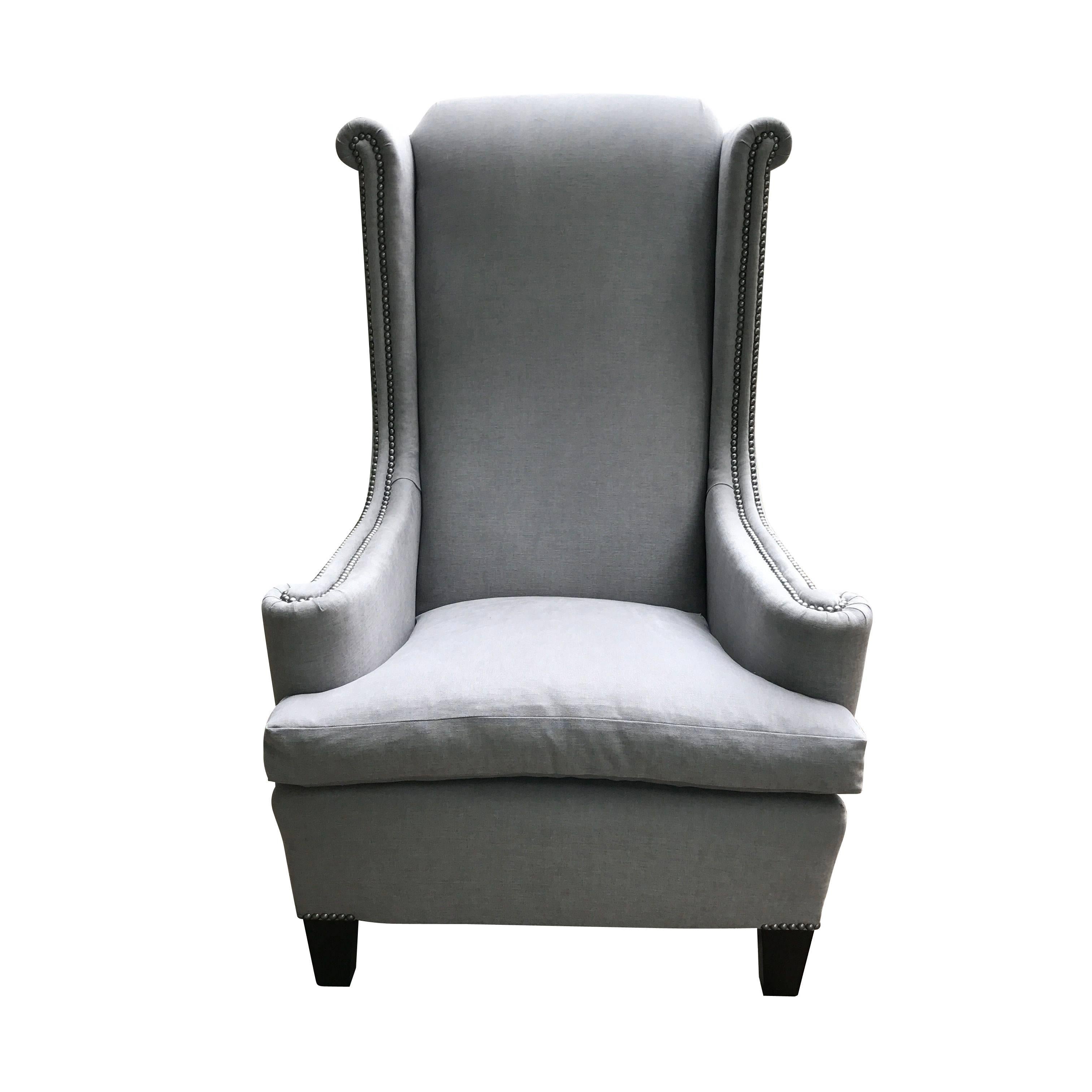 1920s French recently reupholstered high back single side chair.
Decorative nailhead accents frame back of chair and arms.
Very comfortable cushioned seat.
Brushed light grey canvas upholstery.