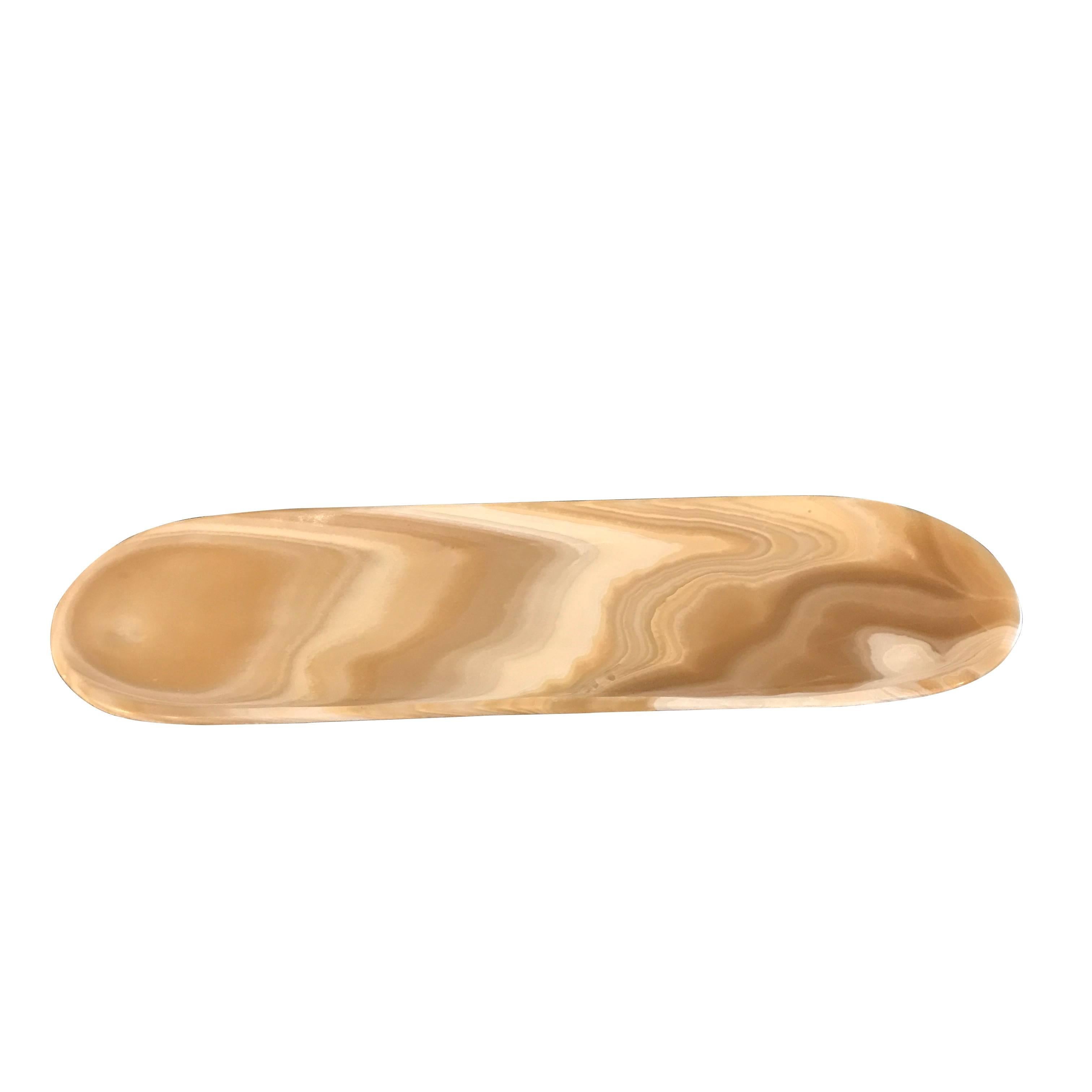 Contemporary honey colored onyx oval shaped tray.
Two patterns available. 
S4676A
S4676B
See images 2,3,4.