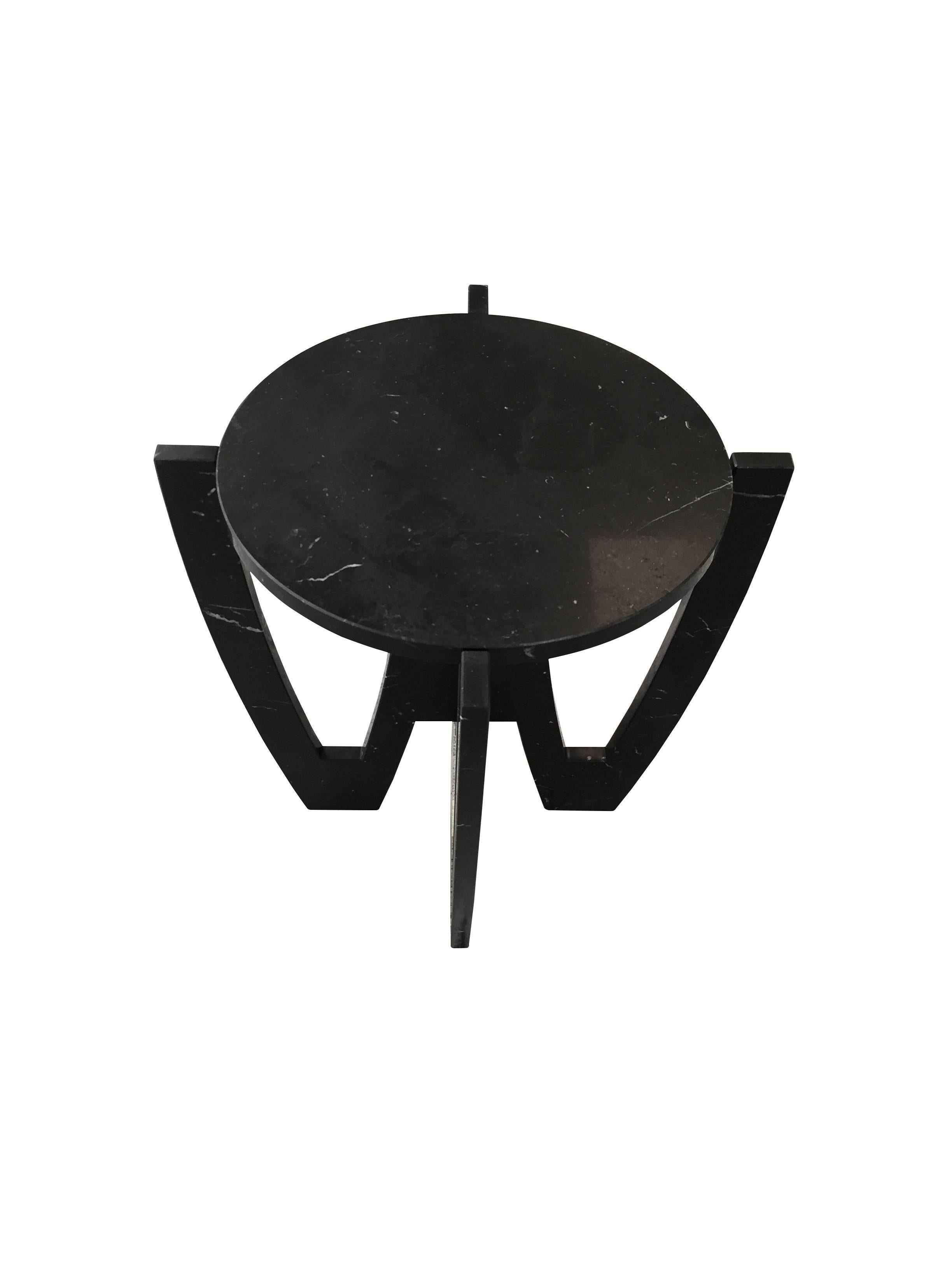 Contemporary round Italian black marble top sits in a very architectural, sculptural base also made of same black marble.
      