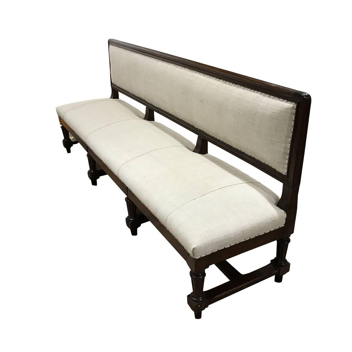 Italian long walnut bench with back, circa 1860
Newly reupholstered in vintage Belgian linen.
 