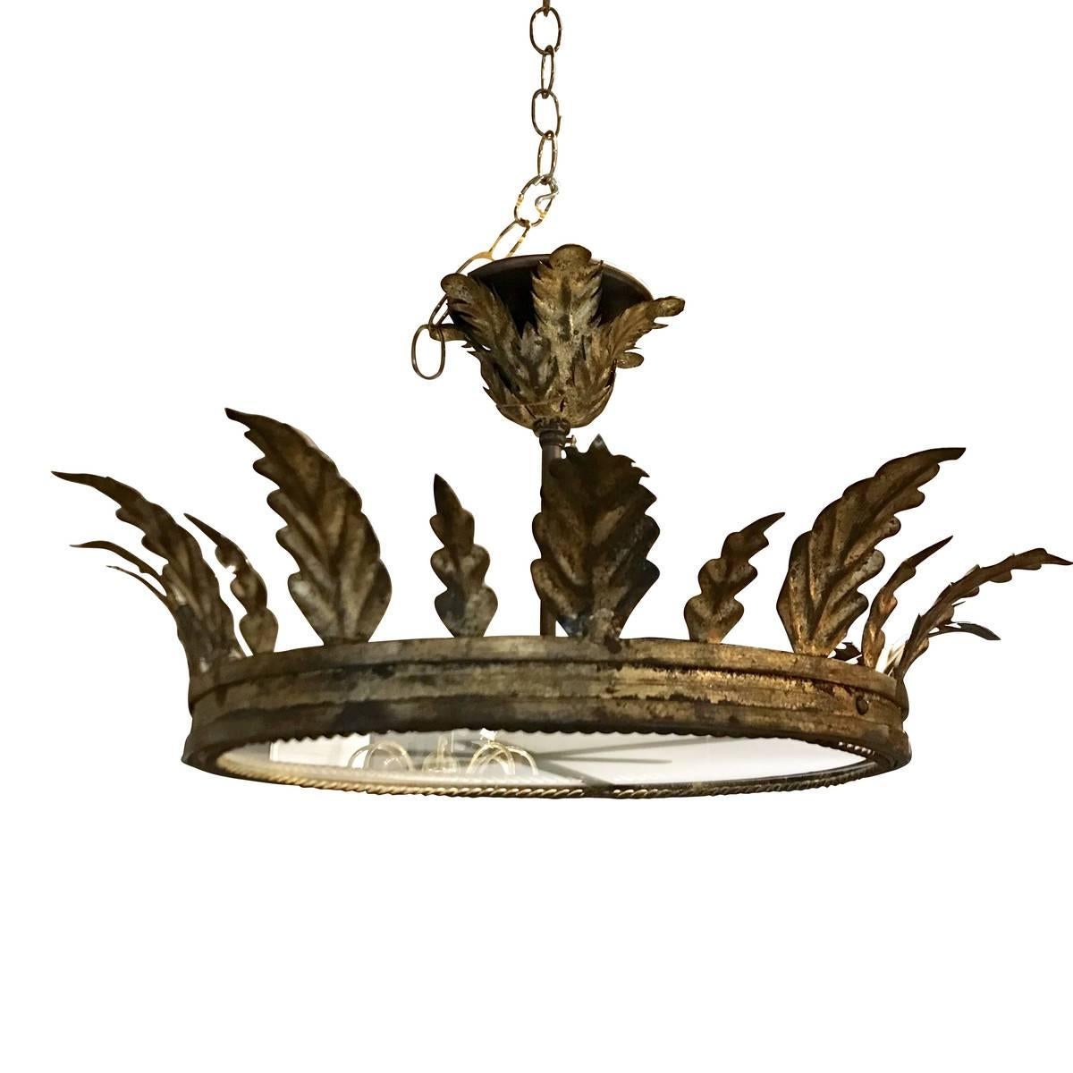 1940s, Spanish large gold gilt metal crown chandelier.
Ceiling mount can be converted to hanging.
Decorative leaf motif.
Newly rewired.