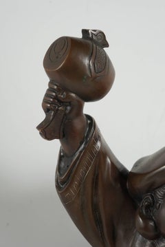 19th Century Japanese Silver Inlayed Bronze Representing Daikoku