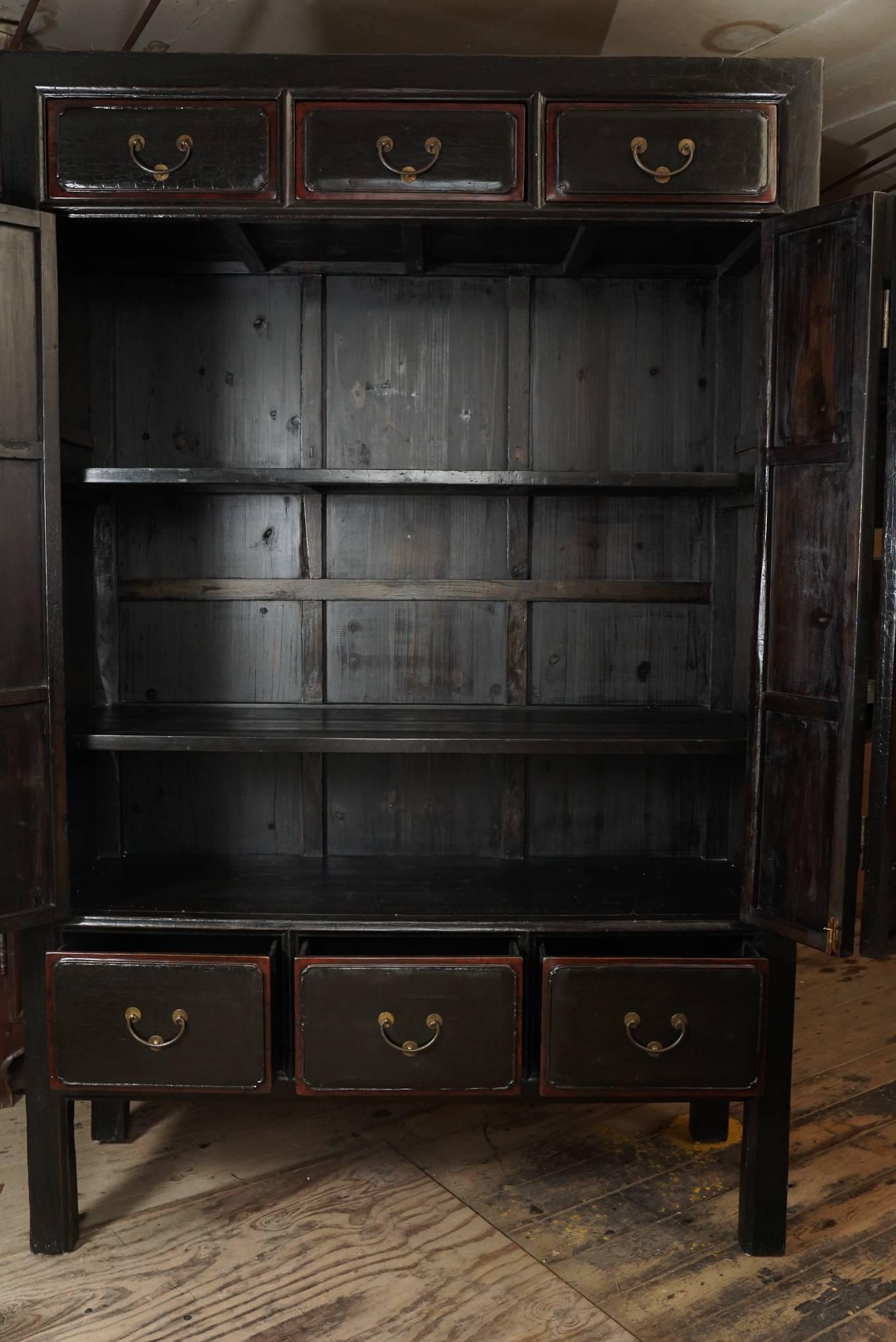 Large Late 19th Century Chinese Black Lacquer Two-Door Cabinet with Drawers In Excellent Condition In Hudson, NY