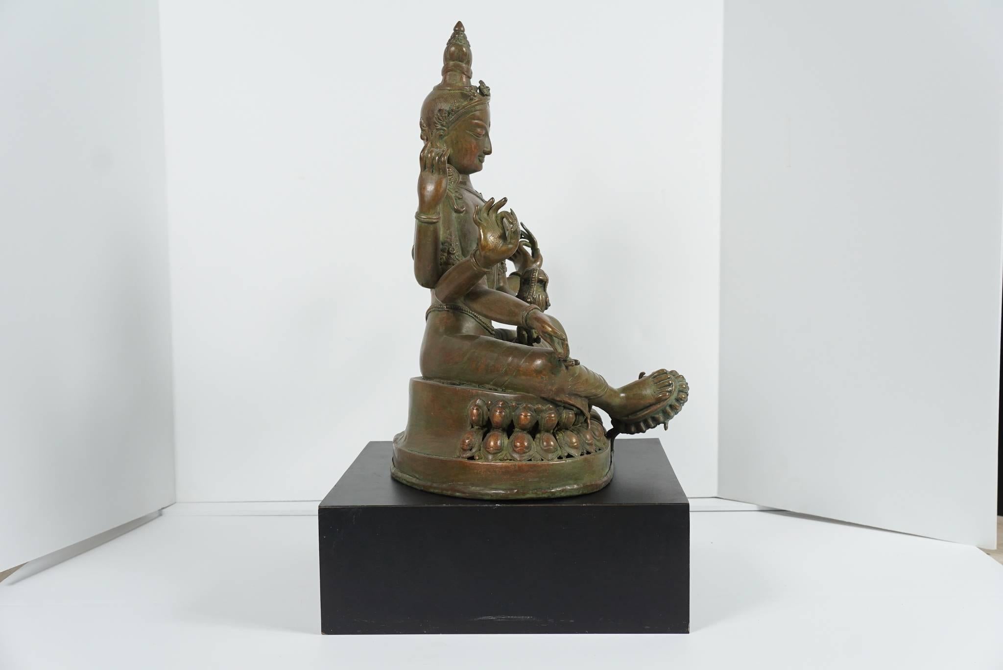 This fine old bronze of Tara was made for the purpose of focusing on the process of meditation regarding her aspects of wisdom and compassion. Crafted in Tibet but nearer to India and its influences this figure is an interesting combination of Hindu