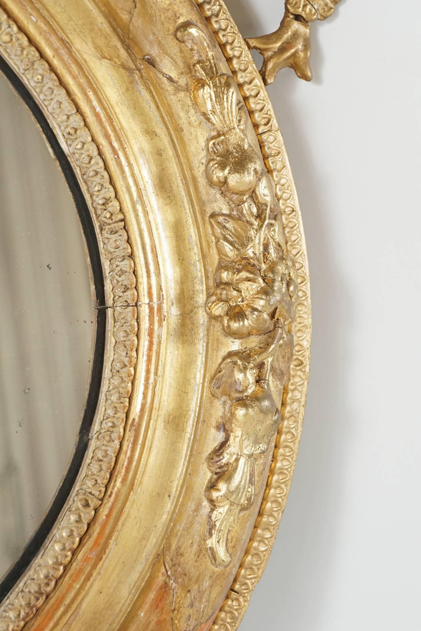 Gilt Victorian Oval Gilded Rococo Revival Mirror For Sale