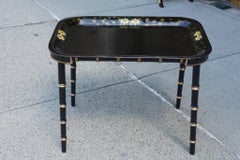 Late 19th Century Tole Decorated Tray on Later Ebonized and Gilded Stand