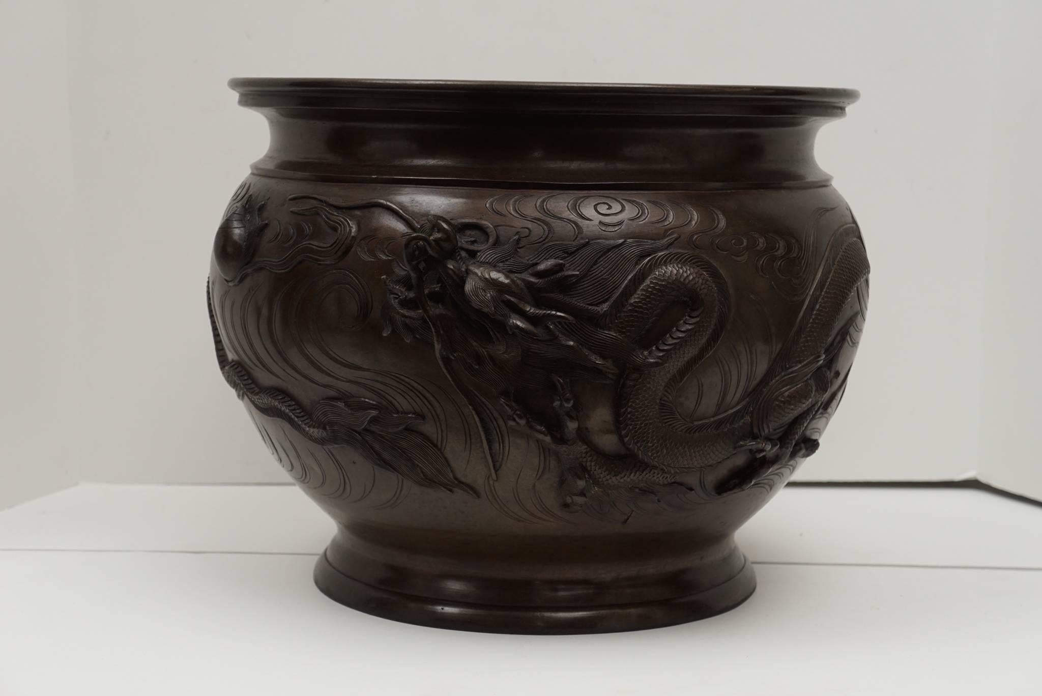 This type of work seen in Japan after the close of the Samurai era was an artistically rich time. Artisans and craftsmen turned to producing works based on rich old traditions but with a potential eye to western markets. This pot usable as a sensor