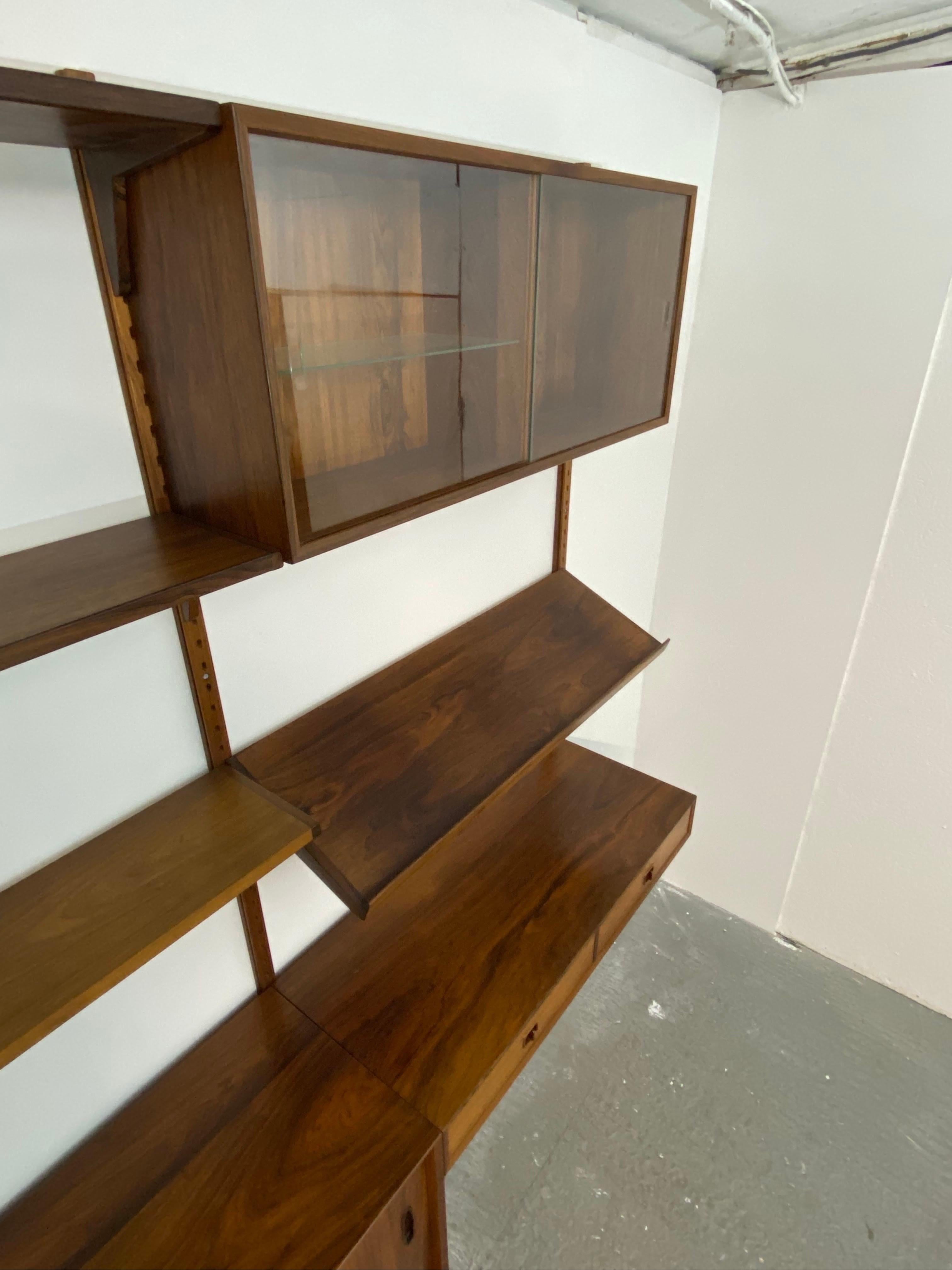 Swedish Nils Jonsson Mid Century Rosewood Shelving system, magnificent condition. For Sale
