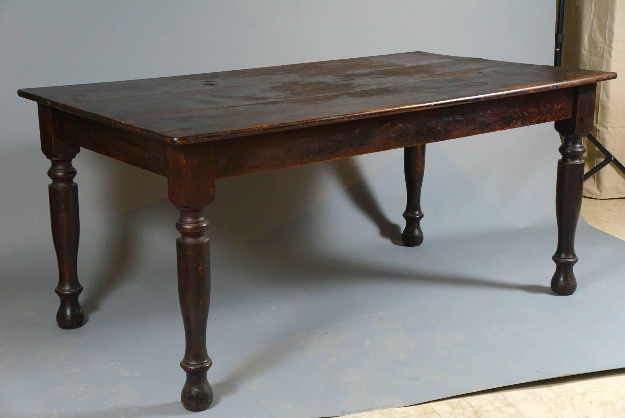 Farm table with deep mahogany finish. Nicely turned legs and a great color.
Table measure 38 inches deep and 66 inches long.