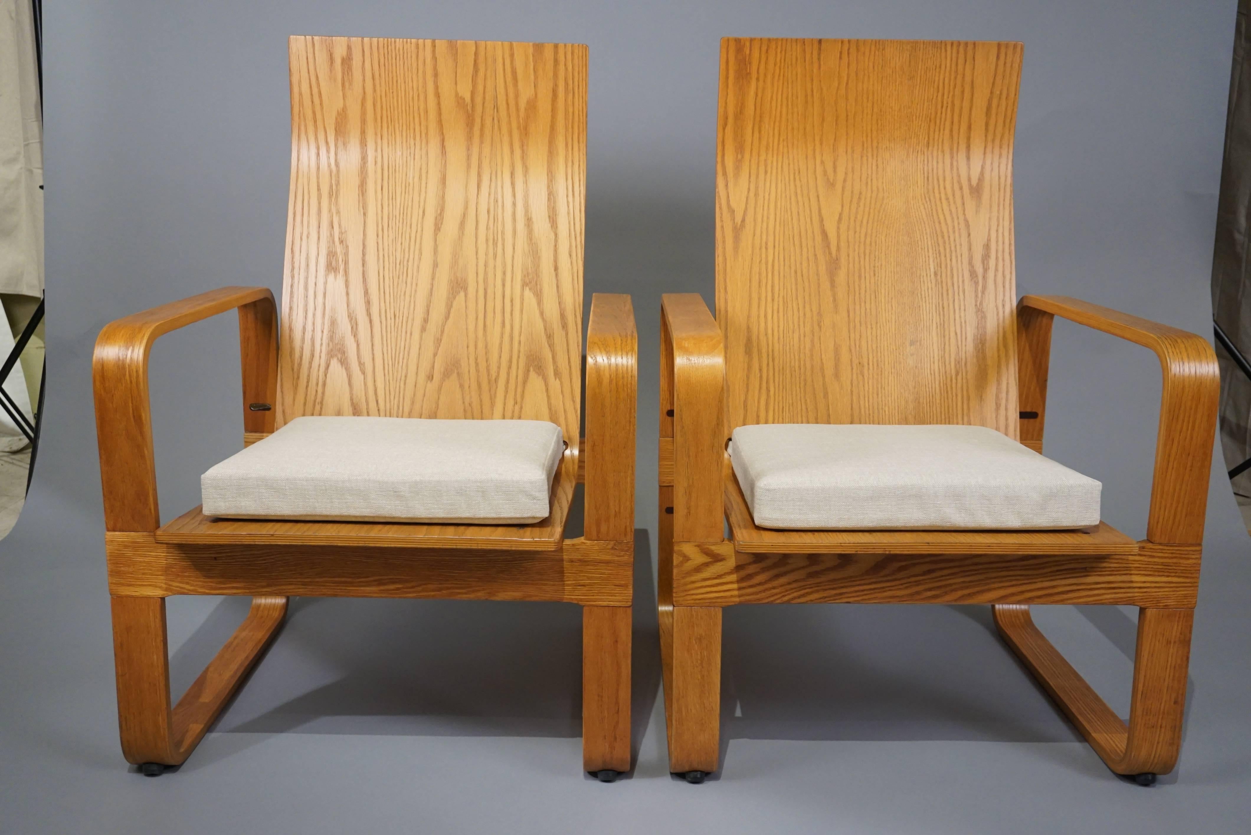 A 20th century pair of chairs created by the Thonet Company.
Bold profile with deep seat and comfortable cushion.