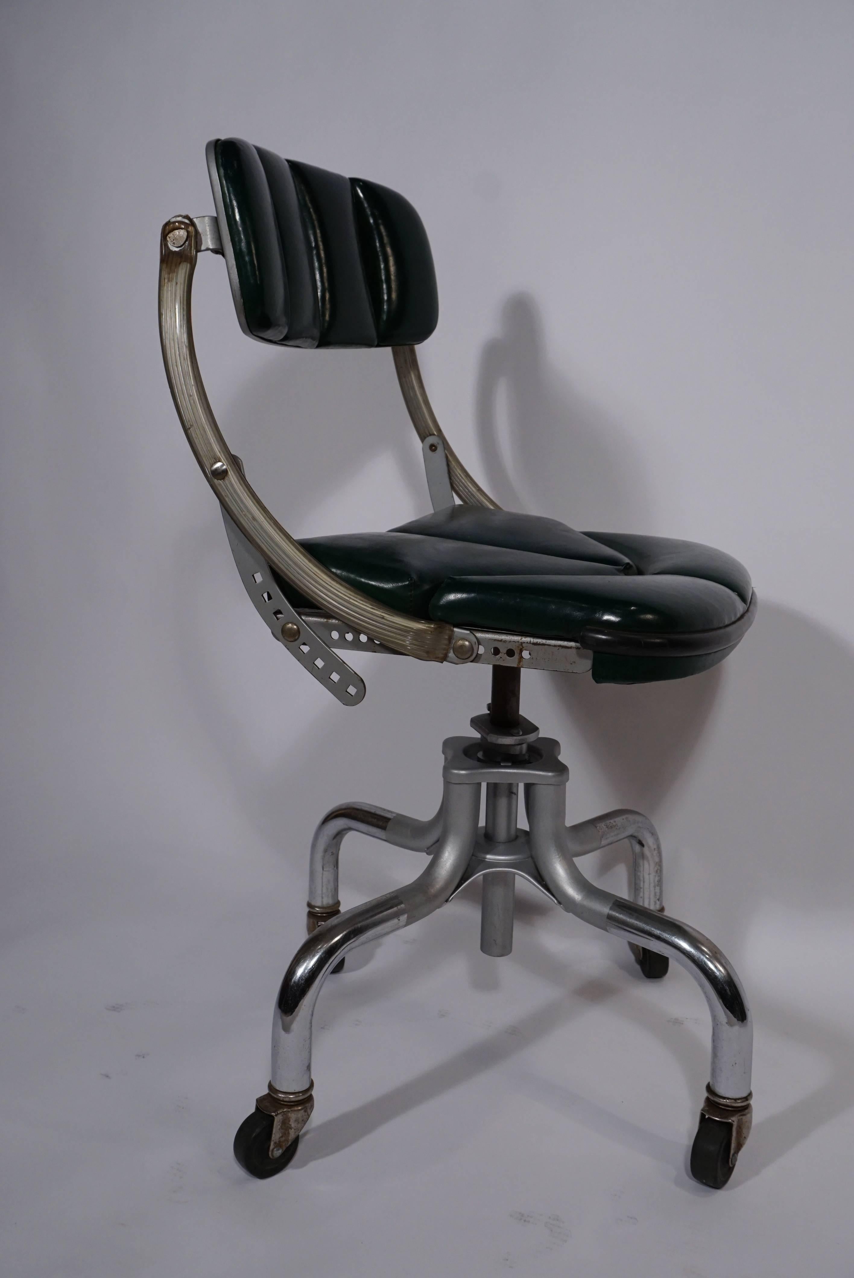Classic 1940s utilitarian office chair in chrome and green leather
known as the 