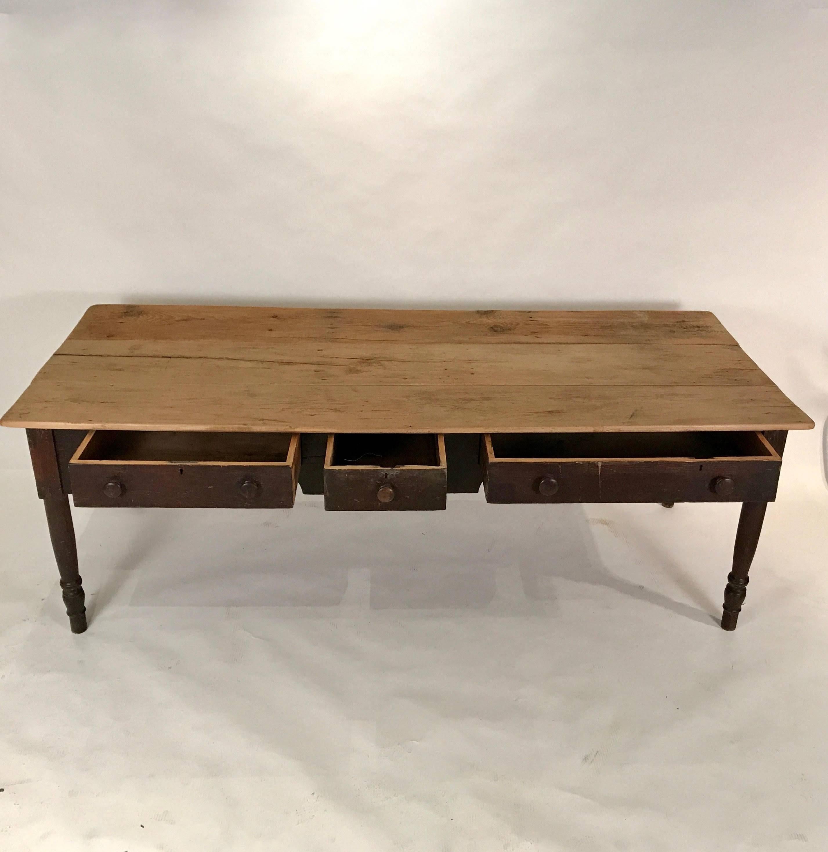 Beautifully Aged Farm Table featuring Three Useful Drawers
A Good Height for Dining (29 inches)     Can be Used as a Large Desk with with a 36 Inch Depth 
