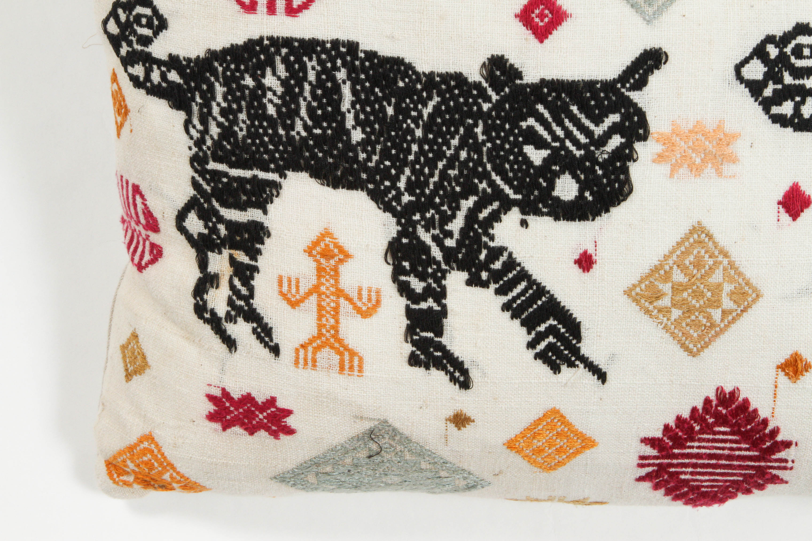 Cotton on cotton embroidered textile with tiger design. Natural linen back. Feather and down fill. Invisible zipper. Two available.