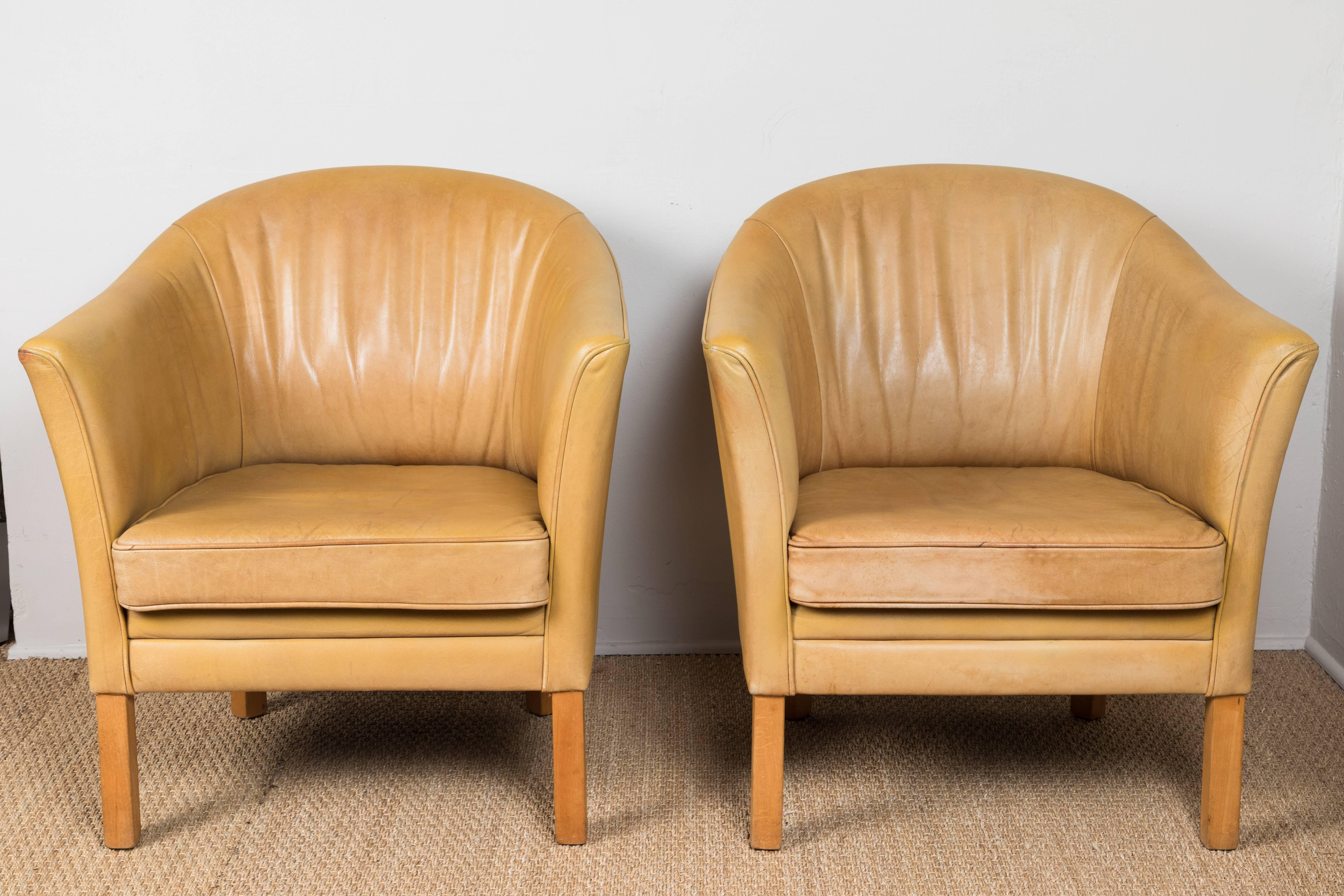 Slightly distressed, vintage honey colored leather chairs.  Sold individually. Offered at .