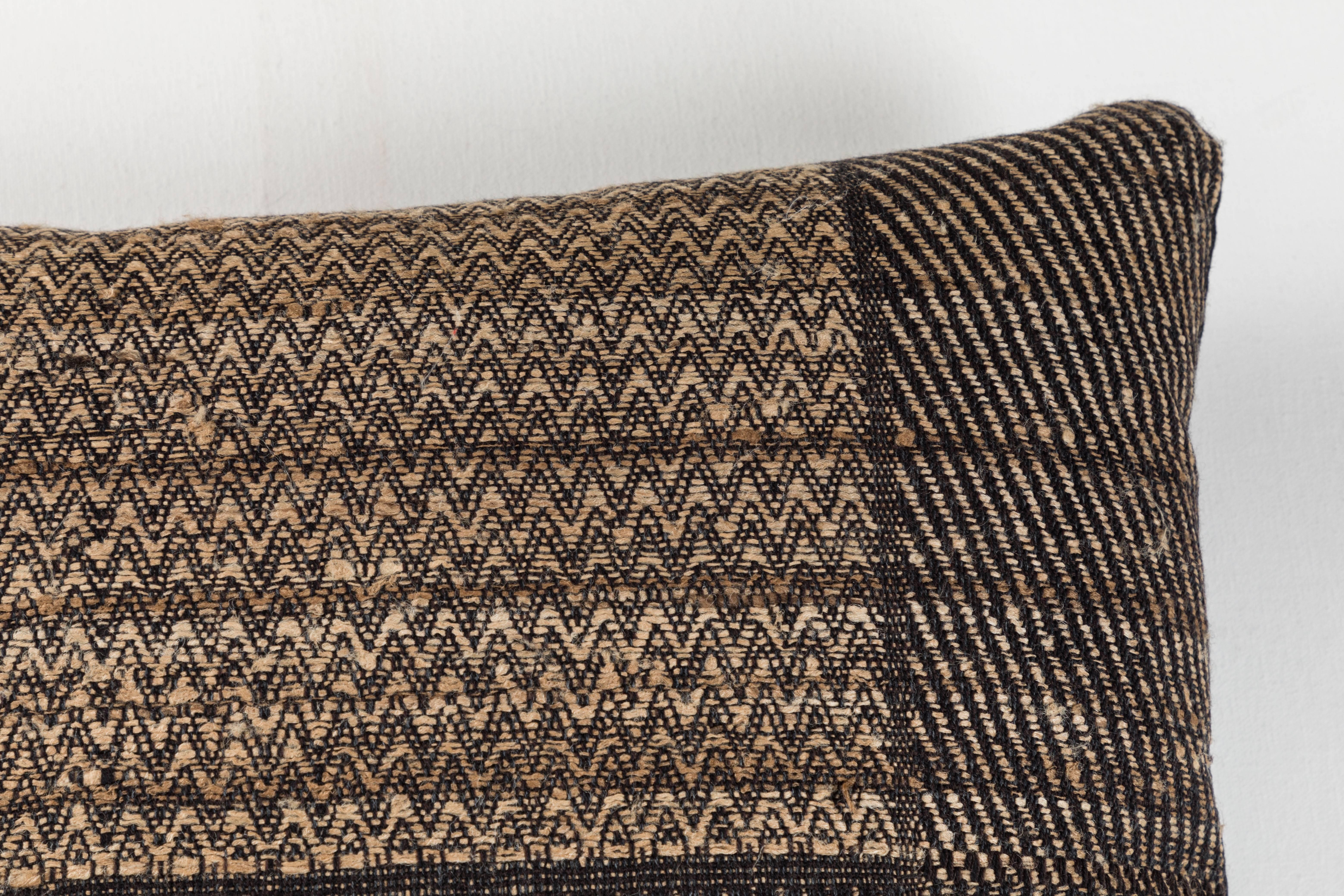 Pat McGann Workshop. 
A contemporary line of cushions, pillows, throws, bedcovers, bedspreads and yardage handwoven in India on antique Jacquard looms. Hand spun wool, cotton, linen, and raw silk give the textiles an appealing uneven quality. Sizes