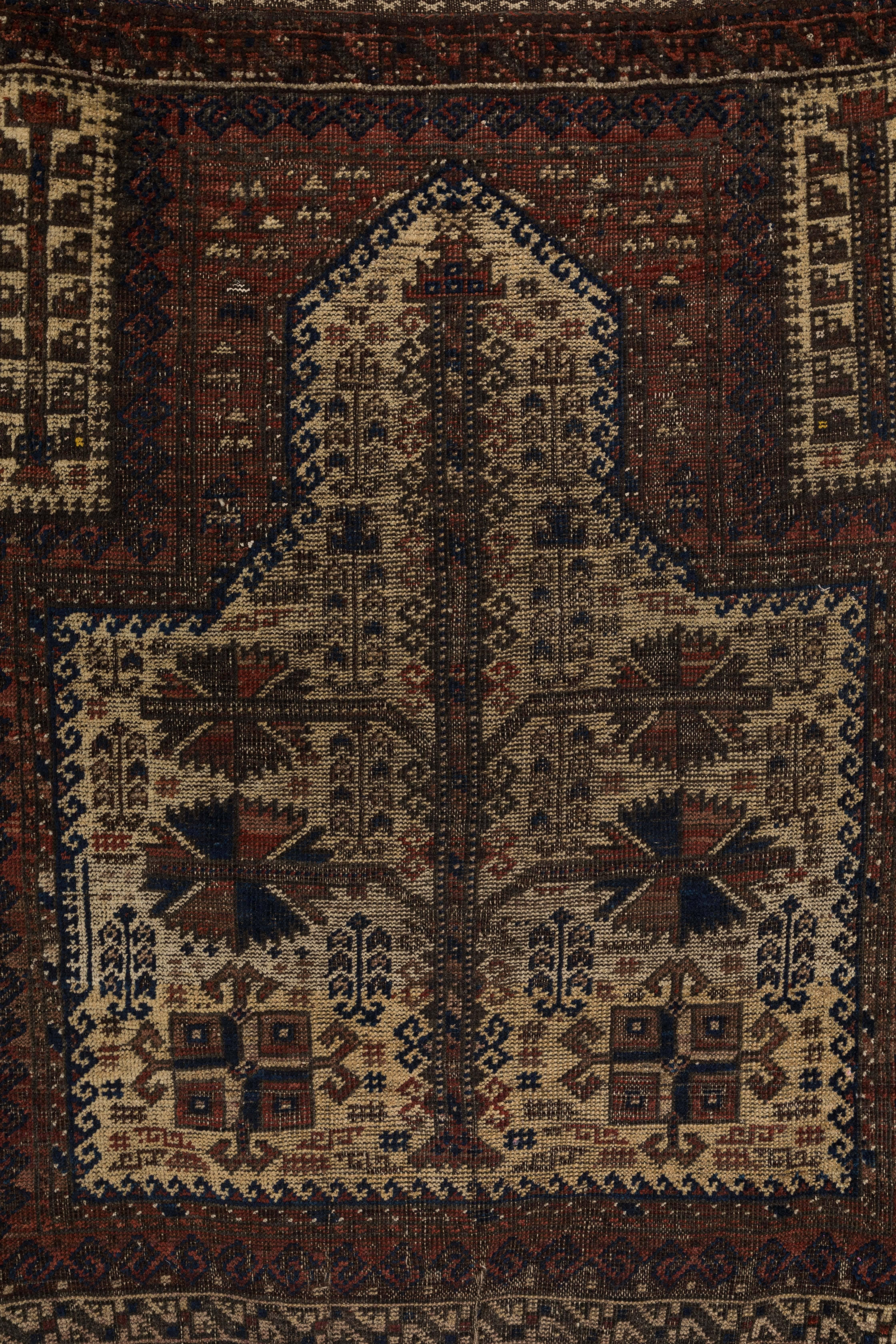 Baluchi prayer rug. Made by nomadic tribes in Iran and Pakistan. Low but even pile and unusual white ground. Ends complete. 100% wool. Soft handle.  Offered at .