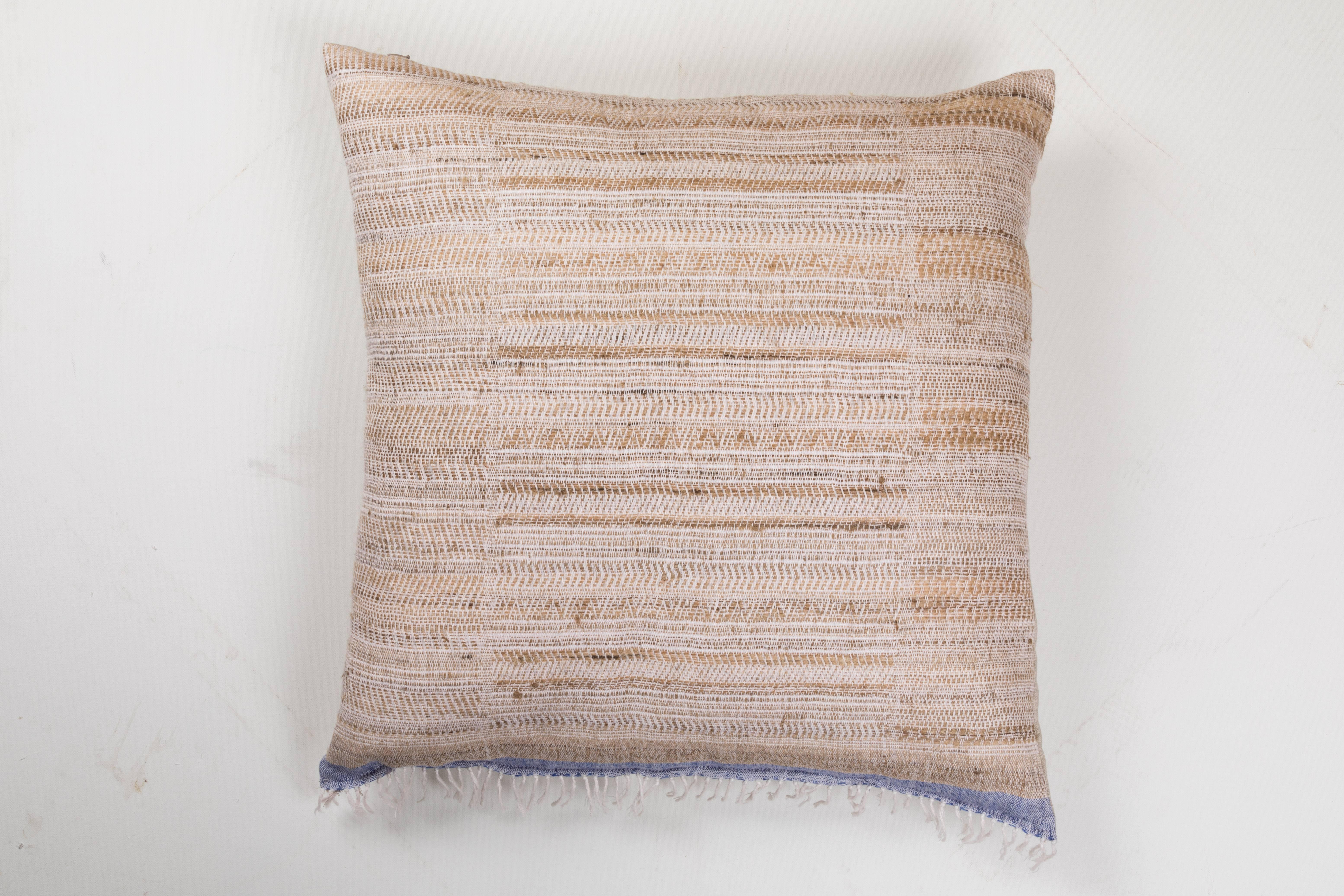 A contemporary line of cushions, pillows, throws, bedcovers, bedspreads  and yardage  hand woven in  India on antique Jacquard looms.  Hand spun wool, cotton, linen, and raw silk give the textiles an appealing uneven quality. Sizes vary