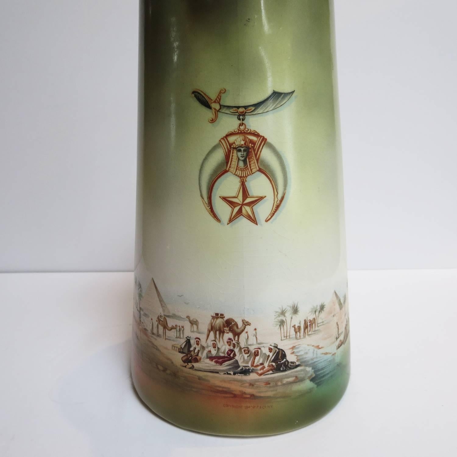 Tuesday night Shriners meetings can certainly build a thirst! What better way to quench it than this lovely Egyptian themed painted pitcher? It is beautifully painted, and copyrights from 1900 PF & Co. NY are in tiny letters on the front. The