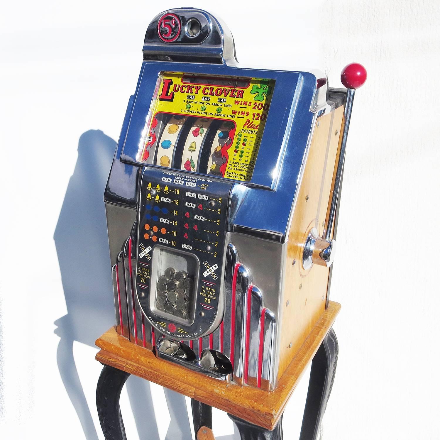 This great slot machine plays well, and looks great. The cabinet was restored some time ago, with the chrome and woods refinished. The machine has just been serviced and lubricated by a local professional. It pays out readily and is fun to play. The