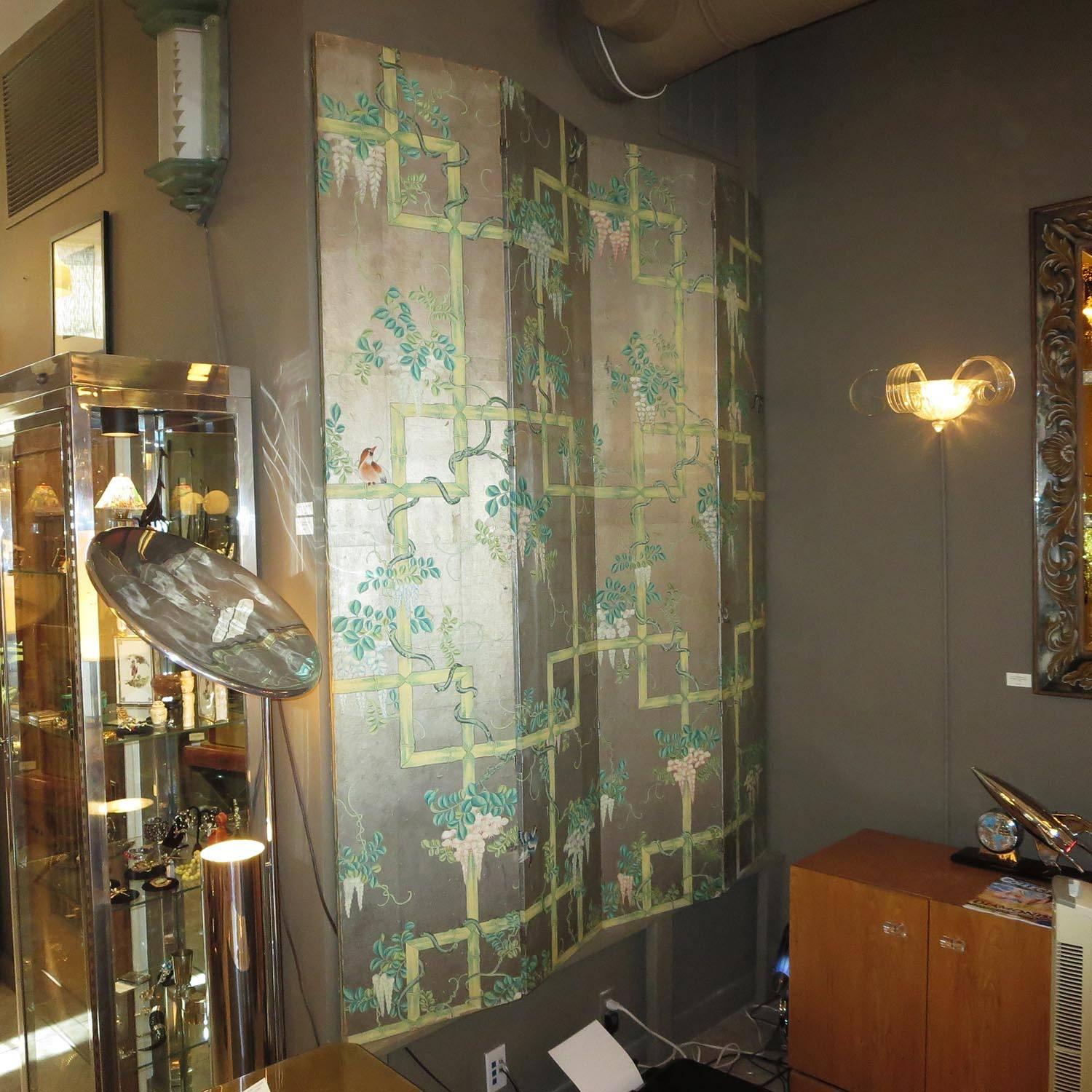 RETIREMENT SALE!!!  EVERYTHING MUST GO - CHECK OUT OUR OTHER ITEMS.				

This fantastic screen depicts birds fluttering through forms of bamboo and draping flowers. Created with multiple sections of silver paper over wood, all decorative elements