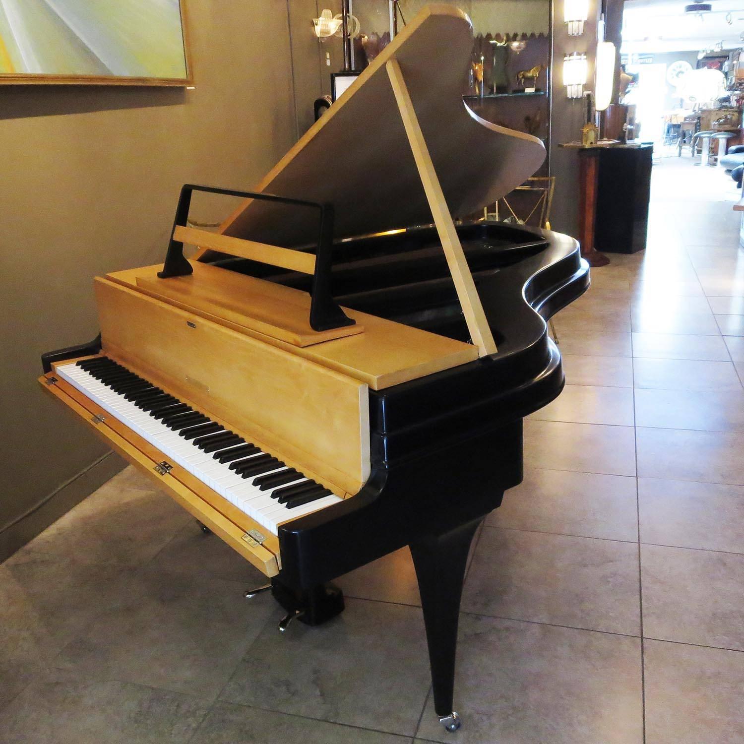 A fantastic instrument cased in a spectacular cabinet! The Rippen aluminum bodied piano was a revolutionary design when introduced in the mid-1950s. They were featured on the Holland America ocean liners and later sold to the public. The tensile