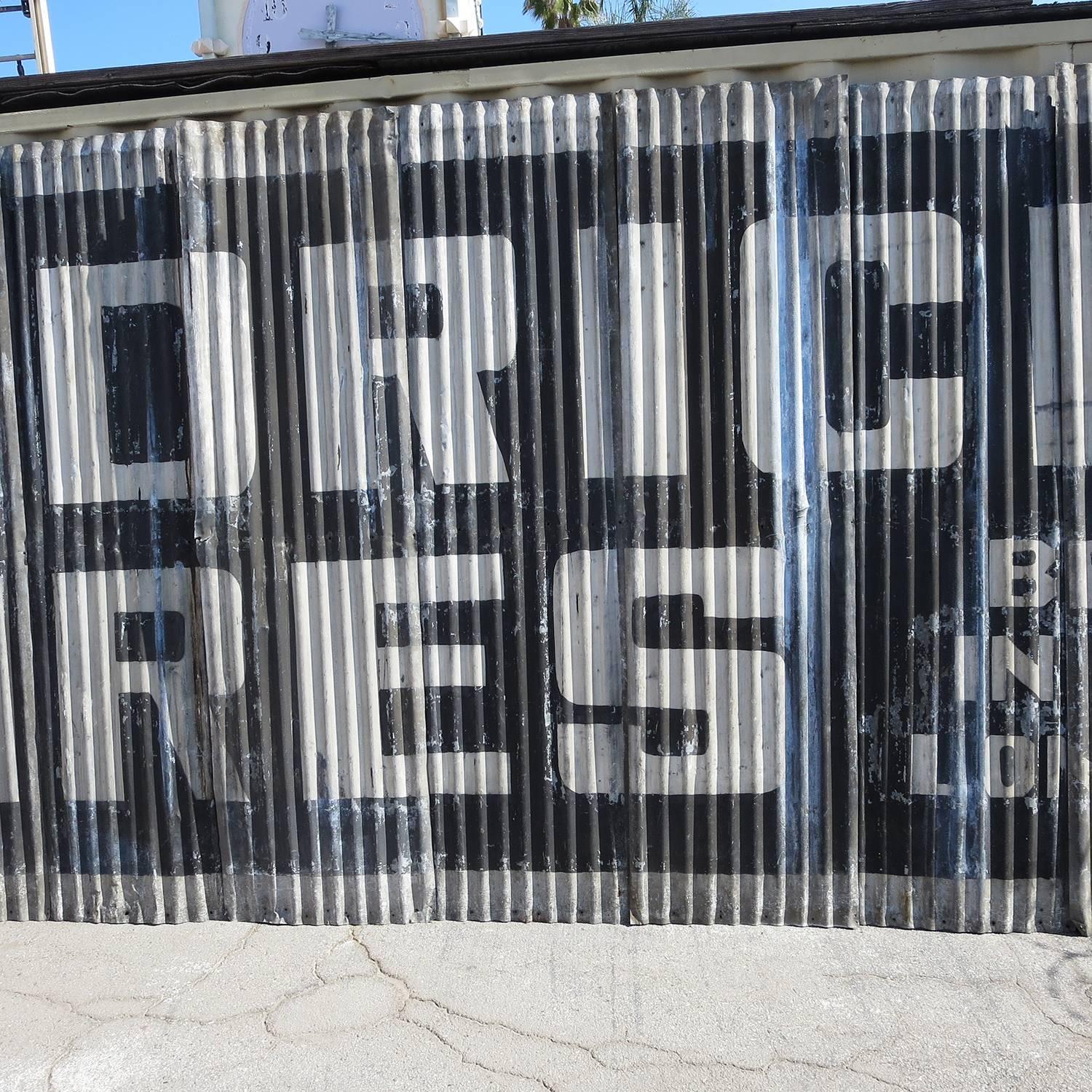 Massive Goodrich Tires Painted Sign on Corrugated Steel Panels In Distressed Condition In North Hollywood, CA