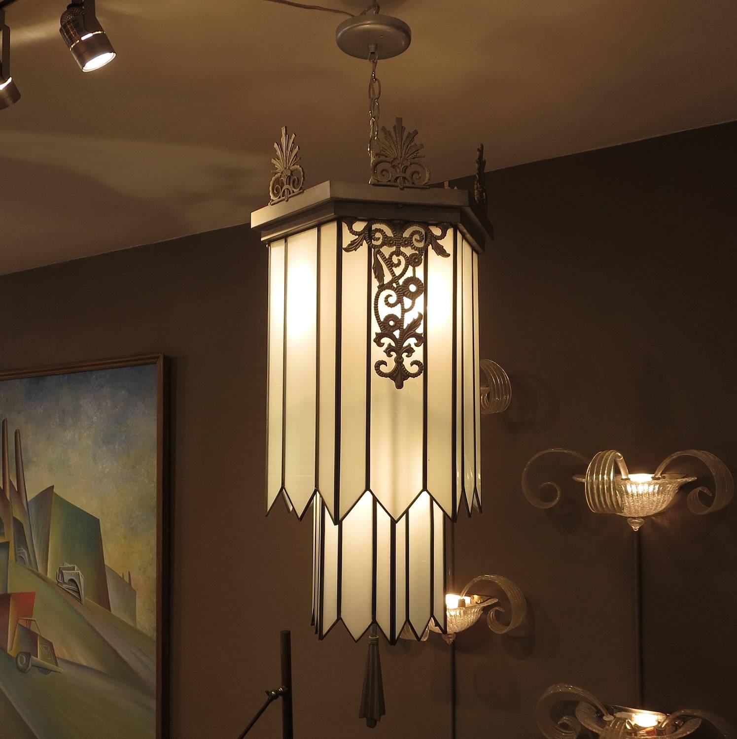 When one thinks back to the 1930s Great Depression, the movie palaces built in the day were escapes of fantasy and opulence. The Art Deco interiors were ultra-glamorous and transported the average person from difficult times. This chandelier is