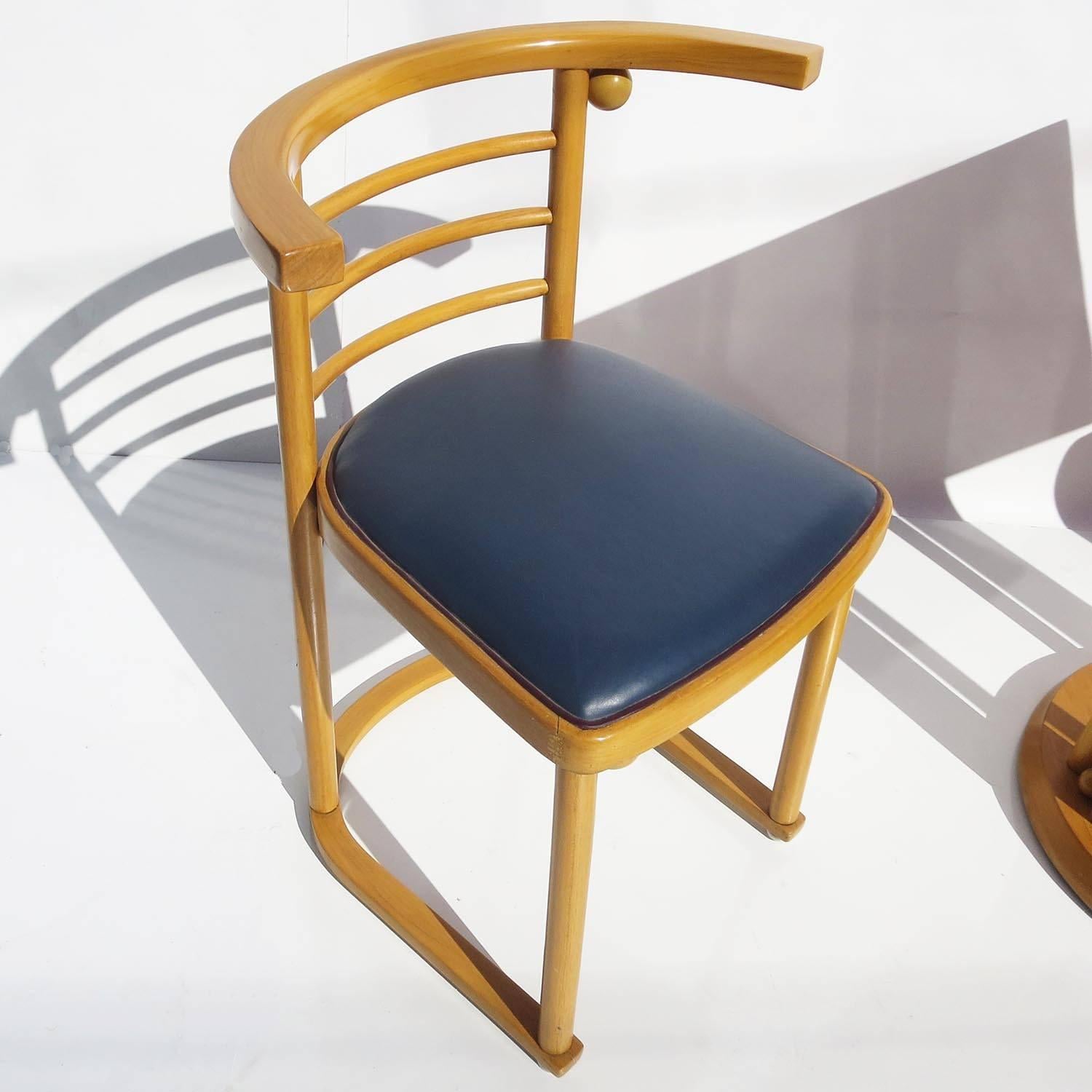 Opened in 1907 in Vienna, the Fledermaus Cabaret had interiors designed by Austrian architect Josef Hoffmann. This design was so well received that it went into limited production by Kohn, and later by Thonet. Our set from the 1930s was refinished
